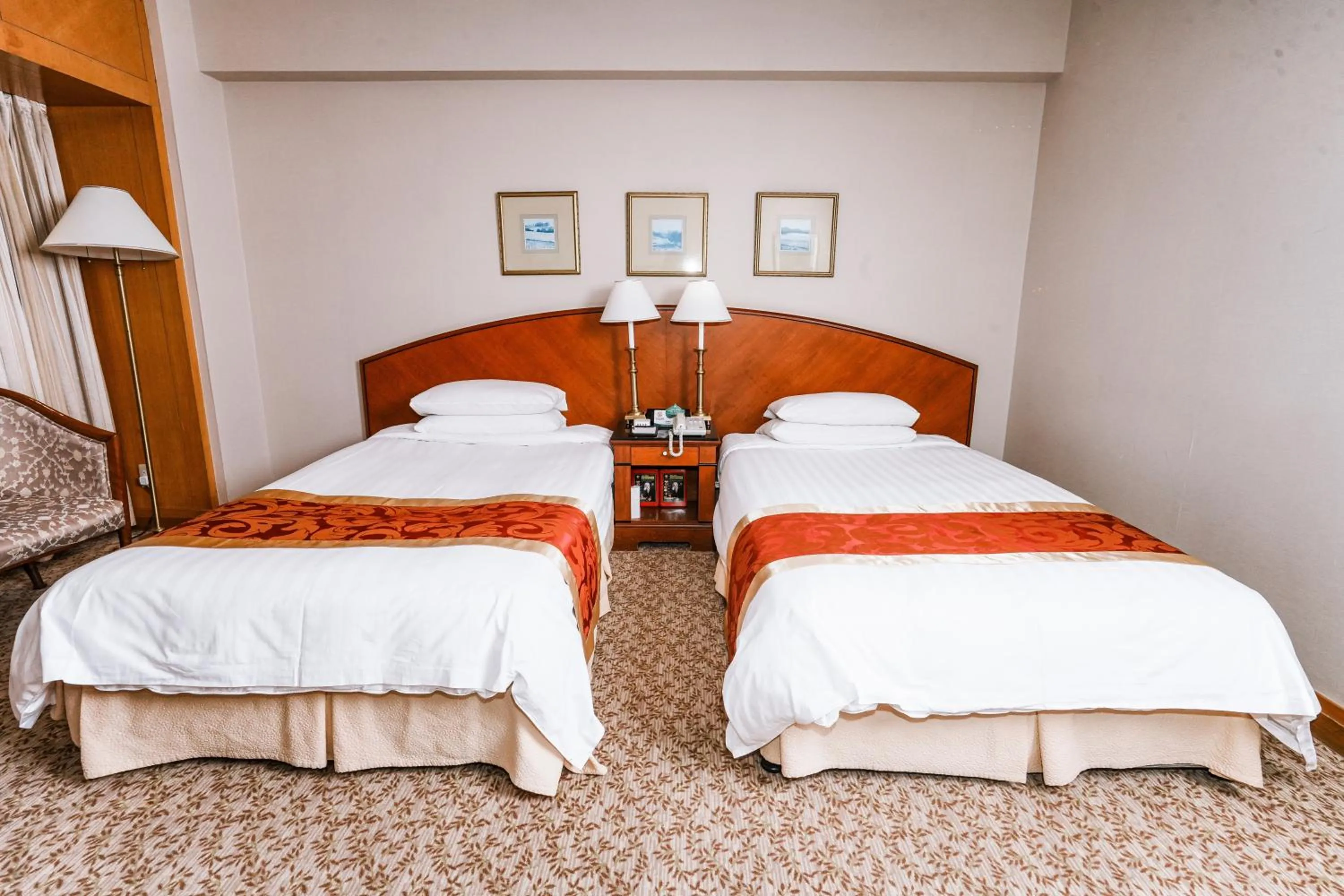 Bed in Ruishi Hotel Dalian