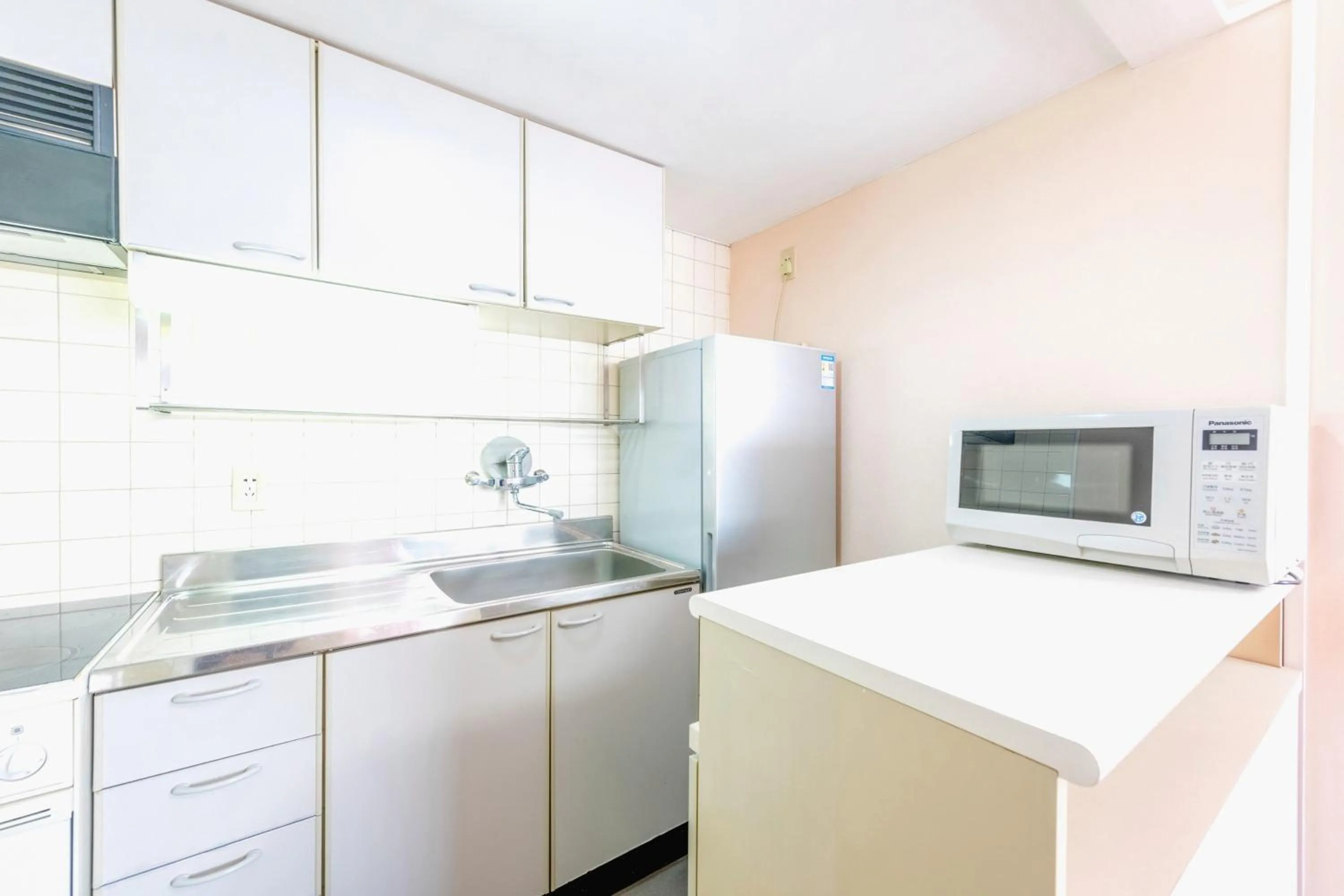 Kitchen or kitchenette in Ruishi Hotel Dalian