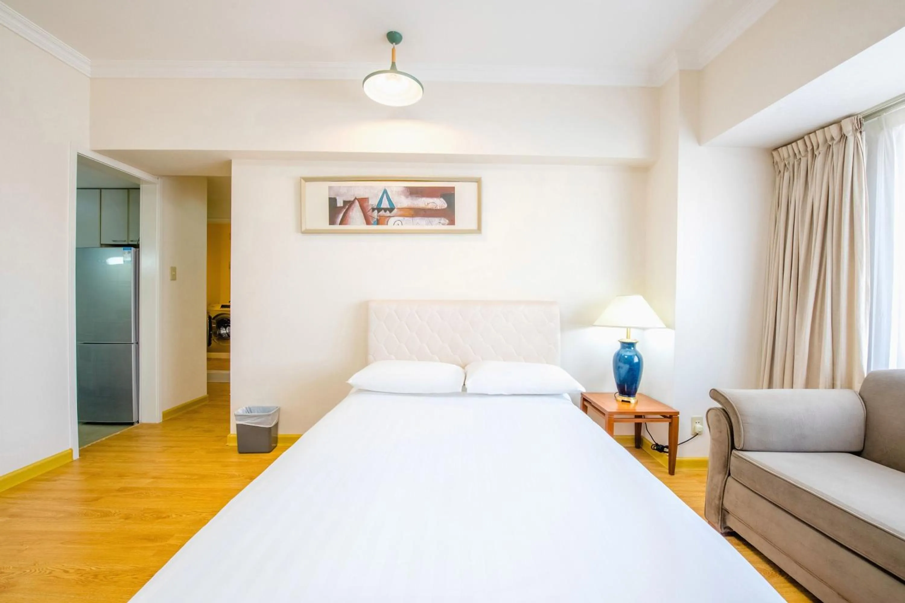 Living room, Bed in Ruishi Hotel Dalian