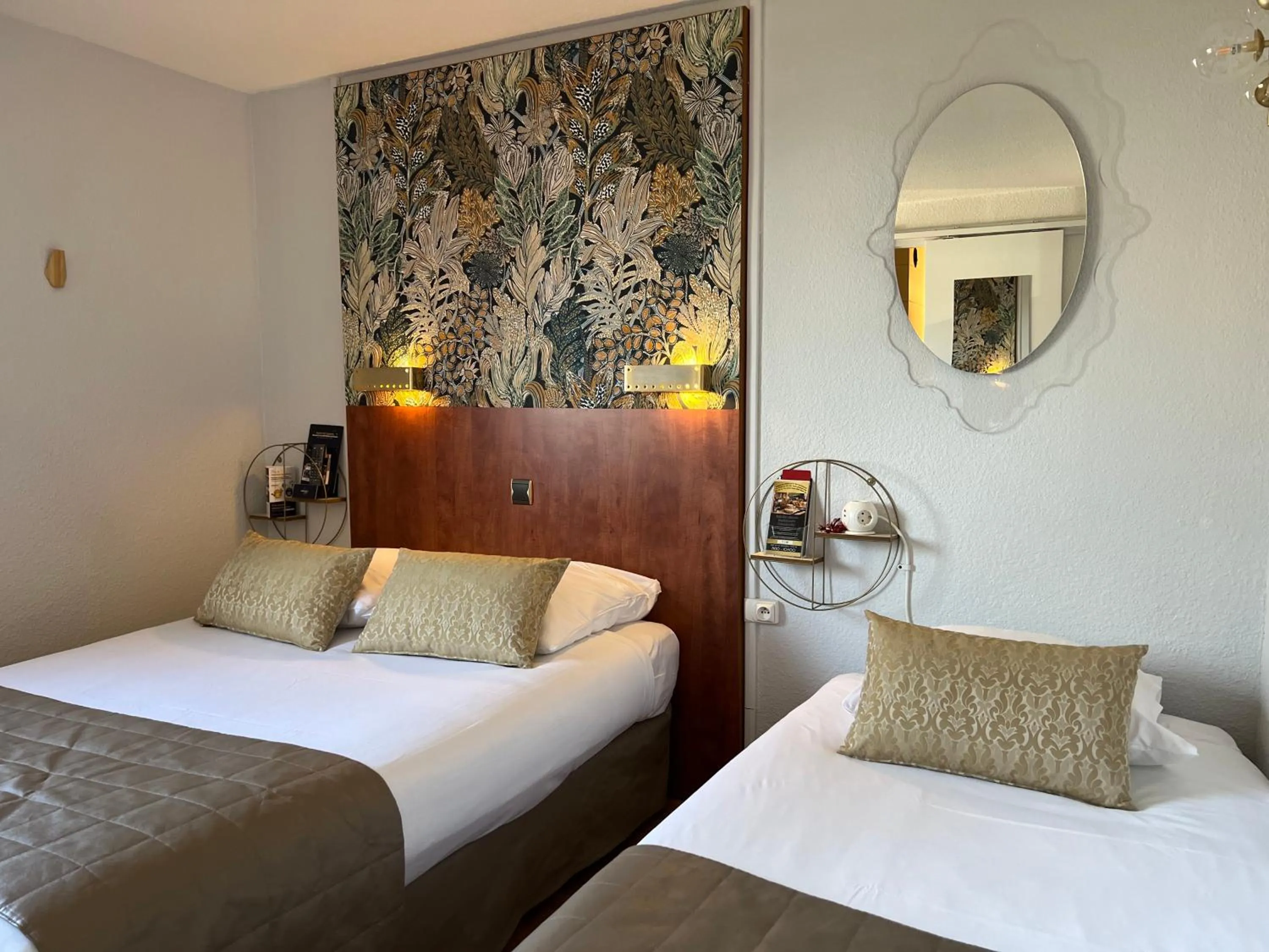 Photo of the whole room, Bed in Hotel Arc-En-Ciel Colmar Contact Hotel