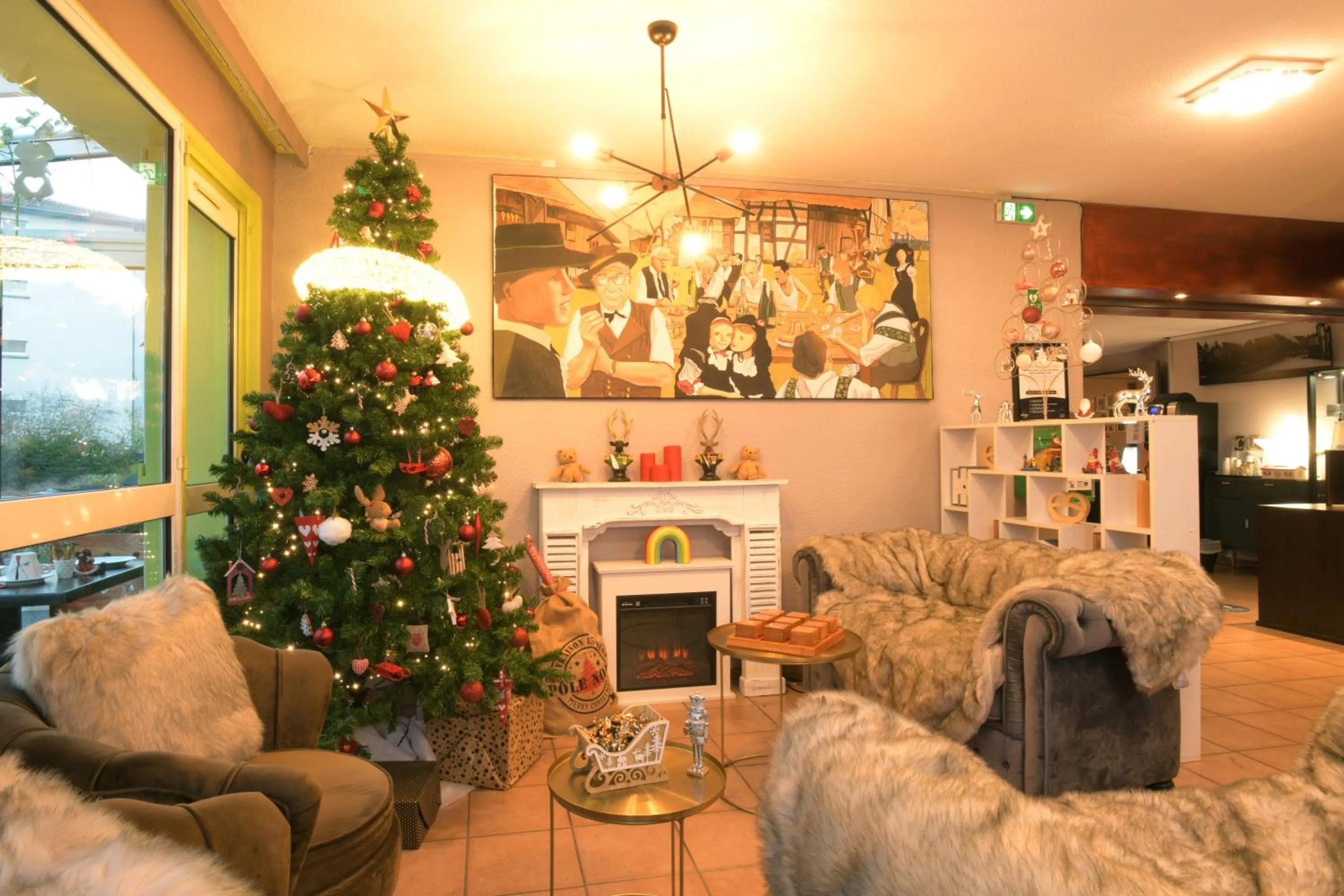 Living room in Hotel Arc-En-Ciel Colmar Contact Hotel