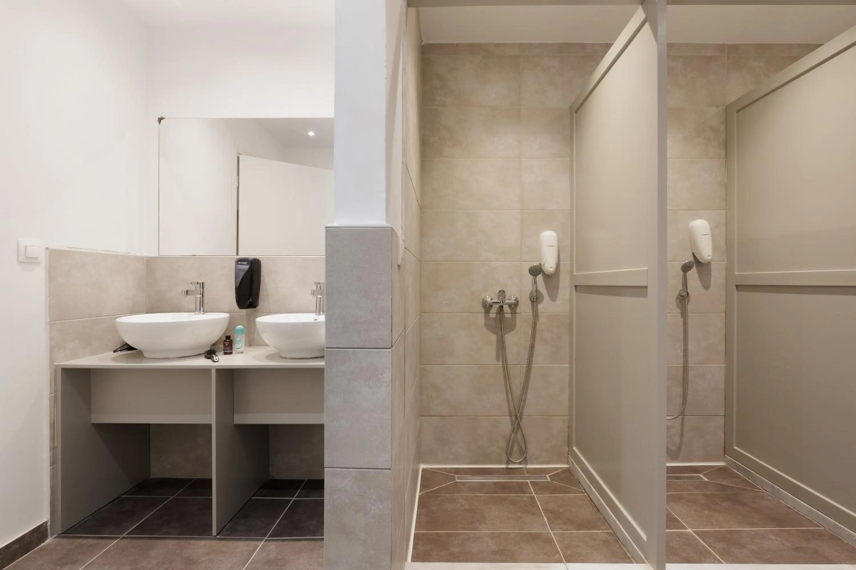 Shower in Local Hostel & Suites