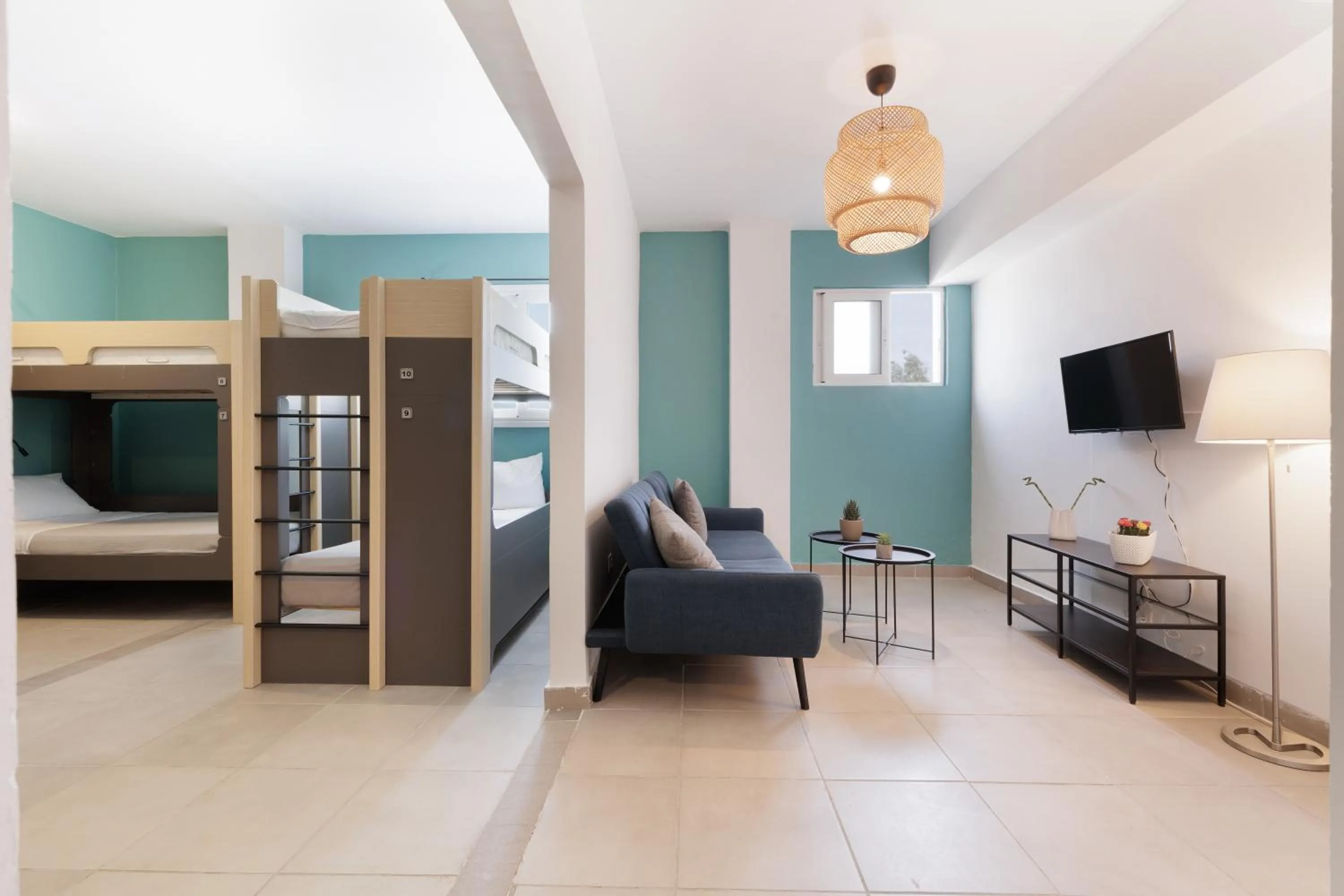 Communal lounge/ TV room, Bed in Local Hostel & Suites