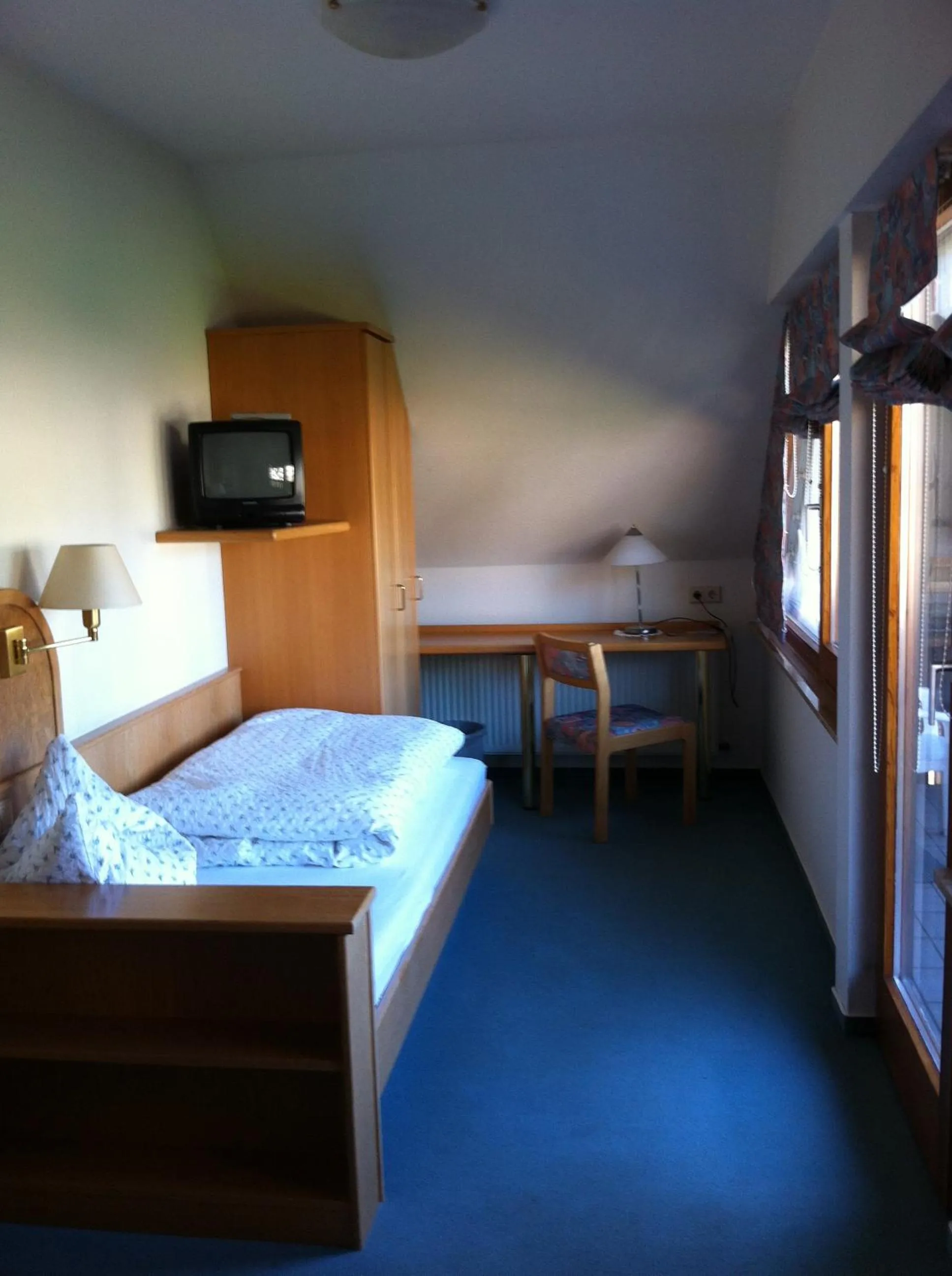 Photo of the whole room, Bed in Gasthof Richebächli