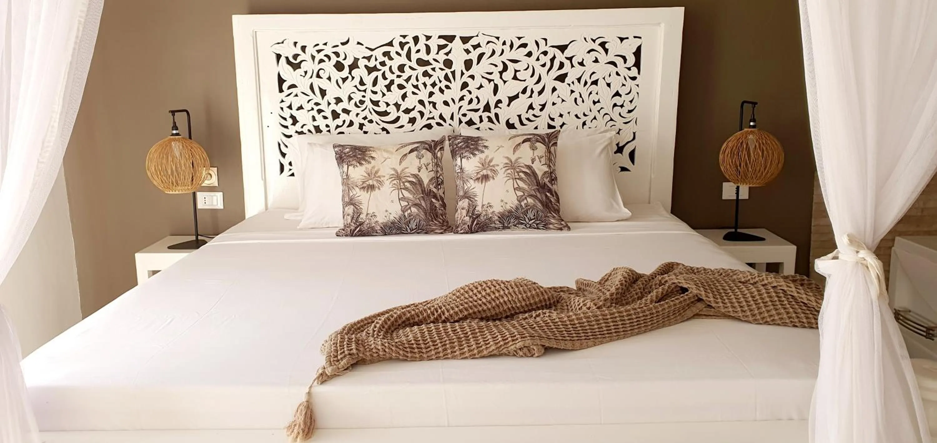 Bed in ARYA Boutique Resort