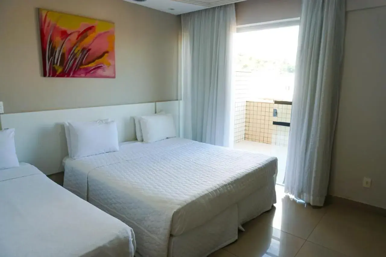 Standard Triple Room in Hotel Pedra Negra Gov. Valadares Standard Triple Room in Hotel Pedra Negra Gov. Valadares