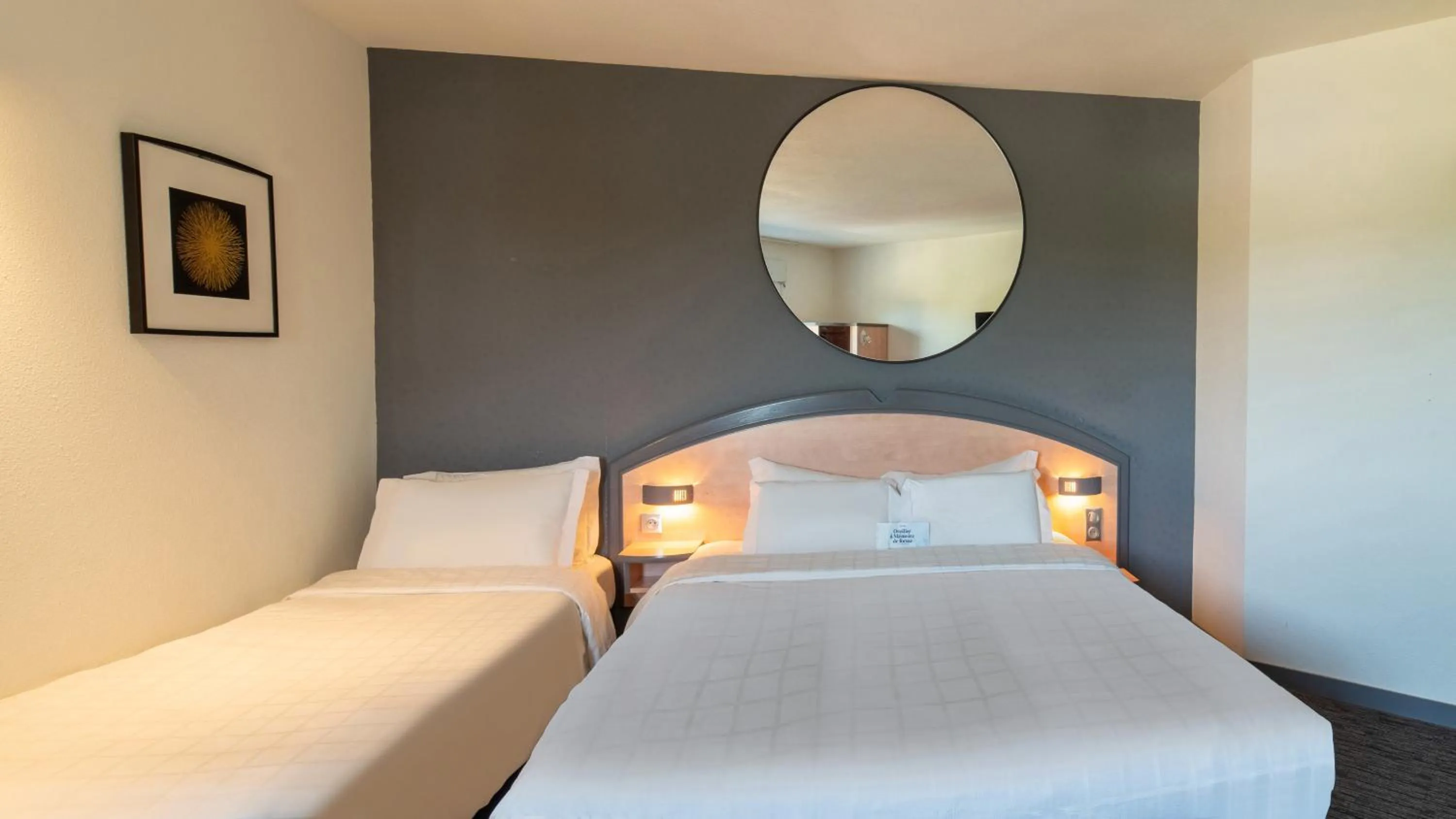 Photo of the whole room, Bed in Hôtel Kyriad Brive Ouest