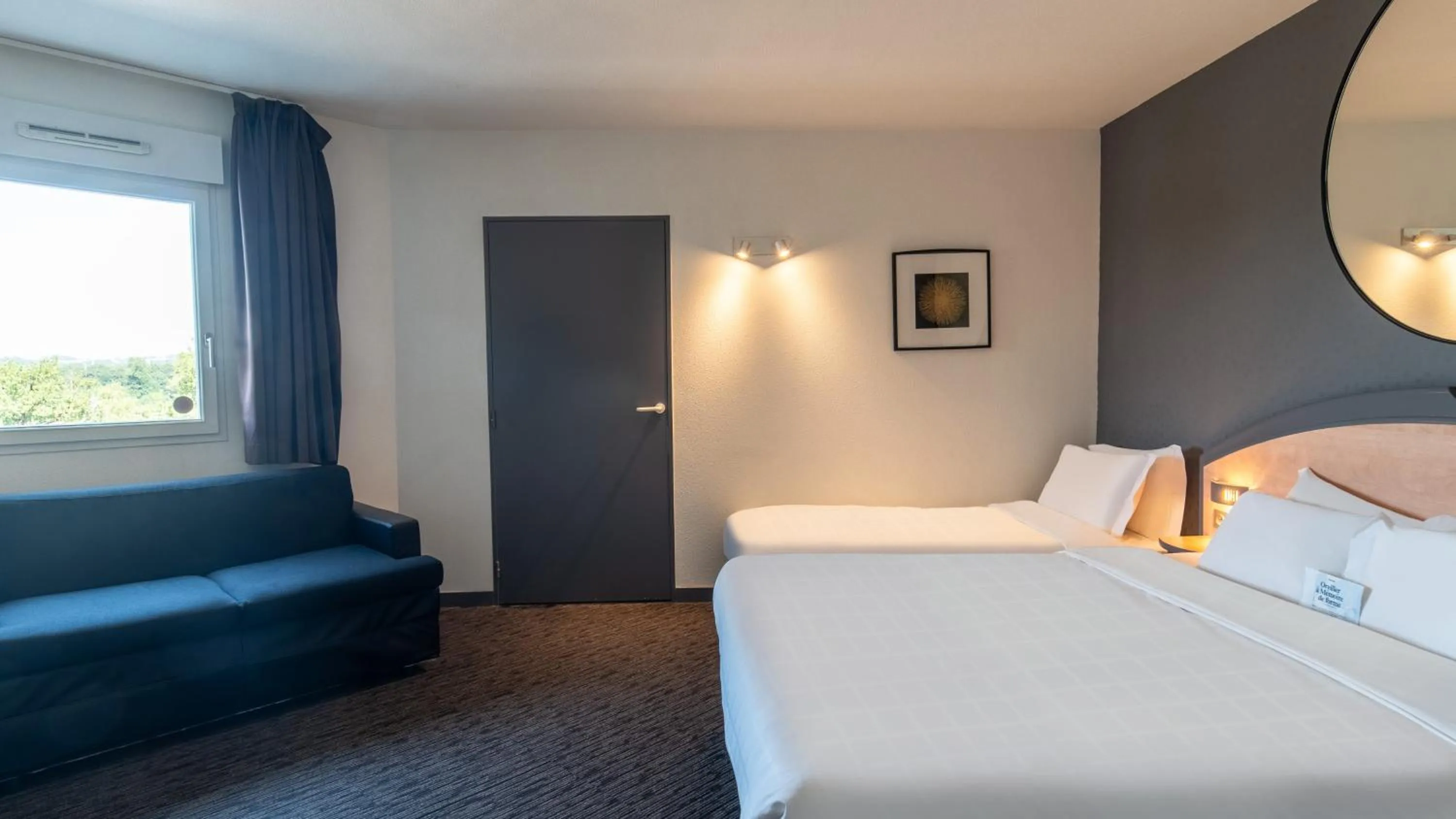 Photo of the whole room, Bed in Hôtel Kyriad Brive Ouest