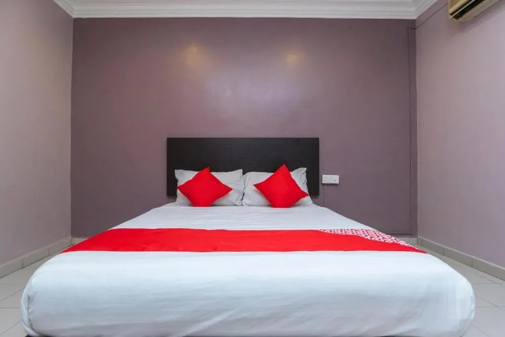 Bed in Golden Horse Hotel