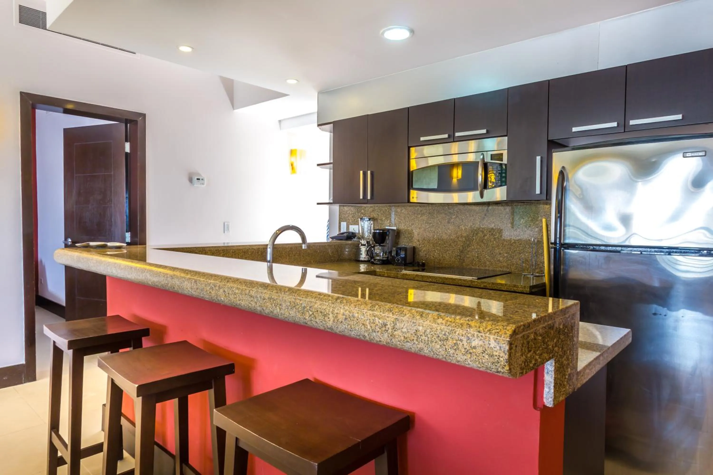 Kitchen or kitchenette in Aldea Beachside Condo by BVR
