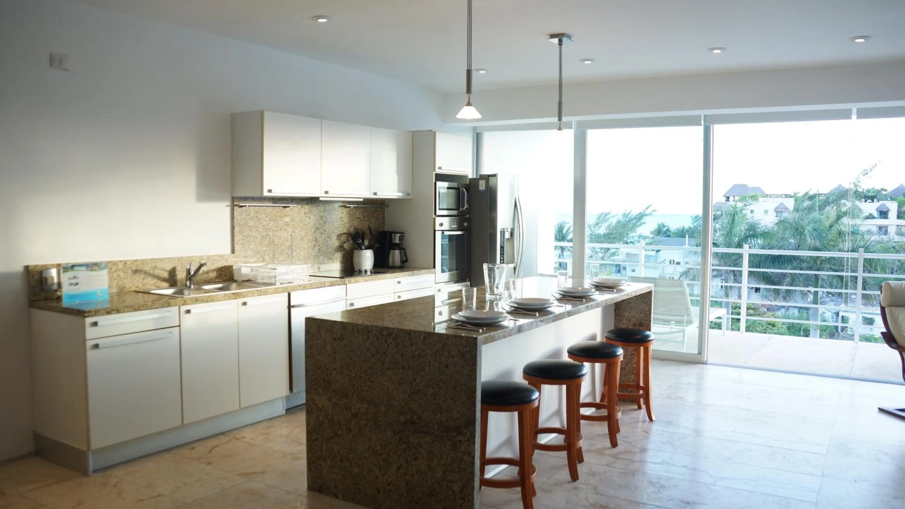 Communal kitchen in Magia Beachside Apartment by BVR