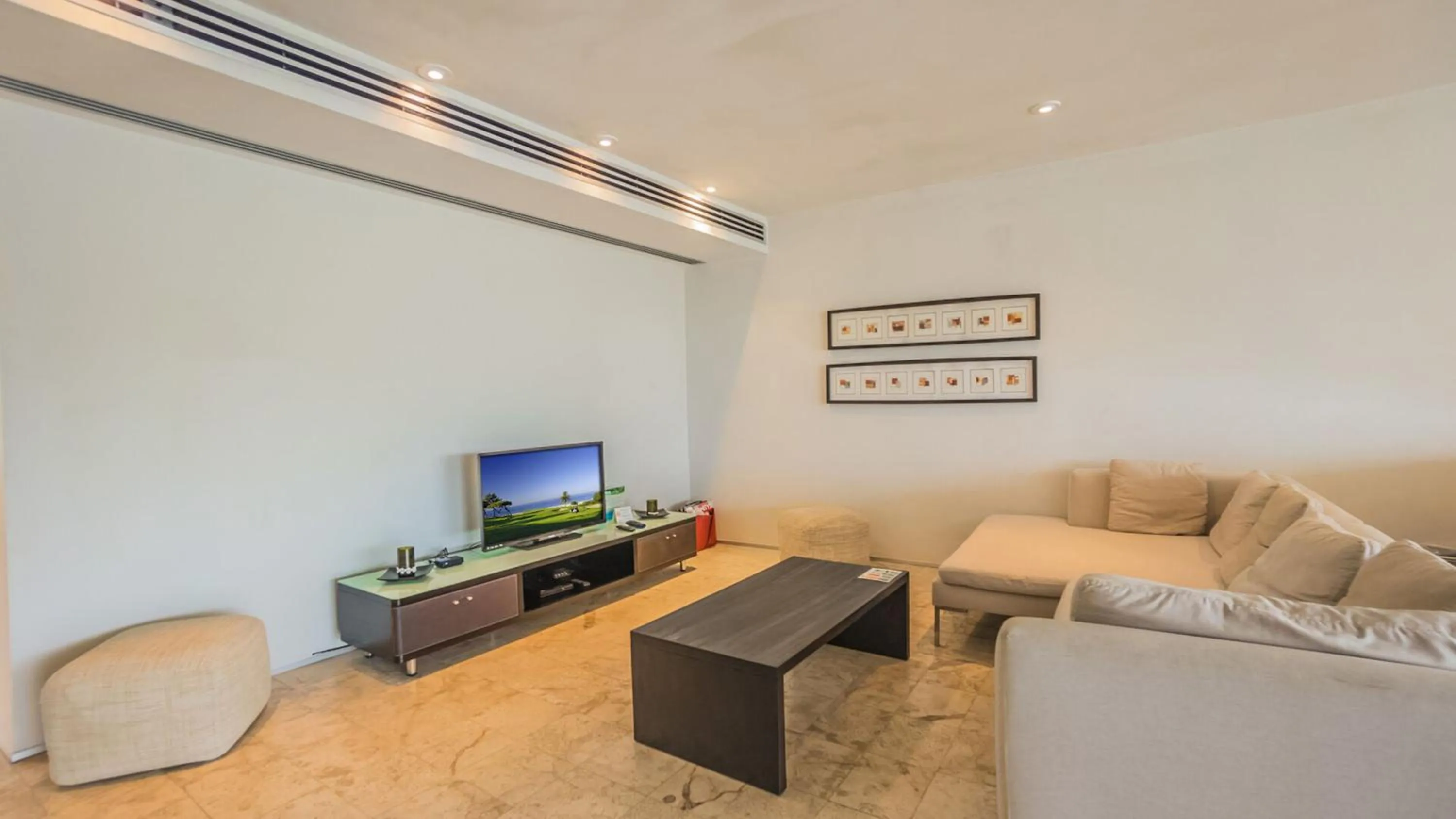 Seating area in Magia Beachside Apartment by BVR