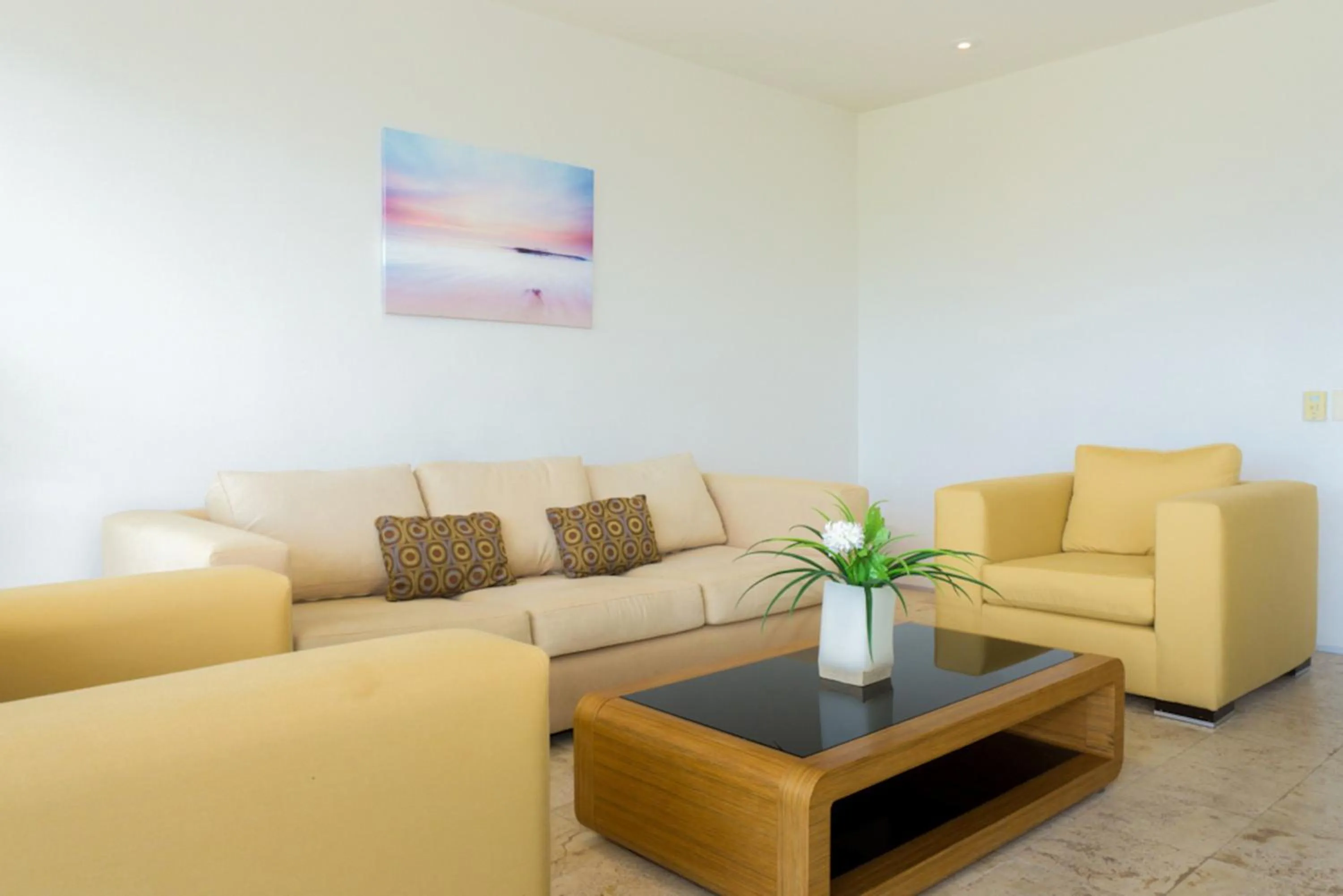 Living room in Magia Beachside Apartment by BVR