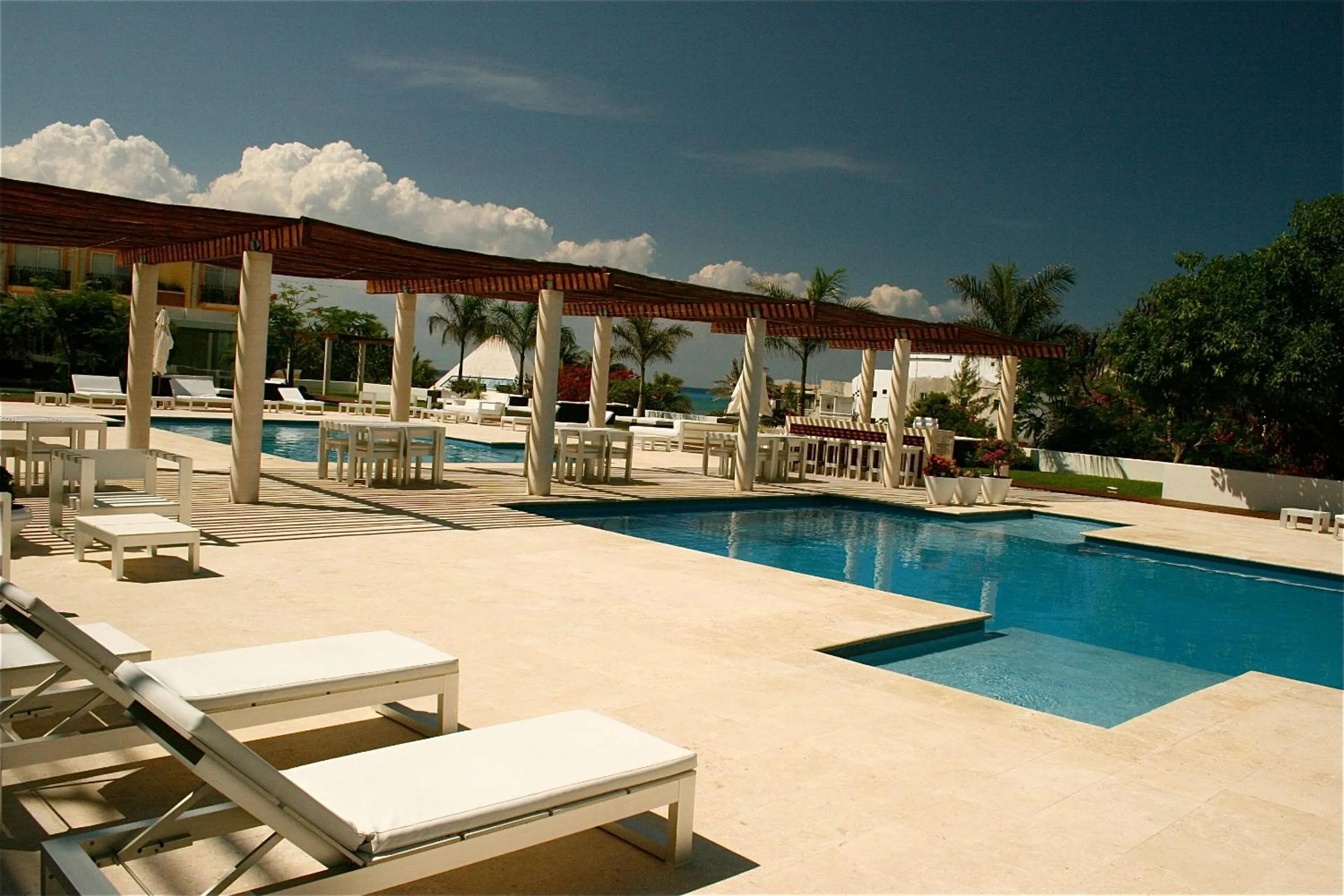 Swimming pool in Magia Beachside Apartment by BVR