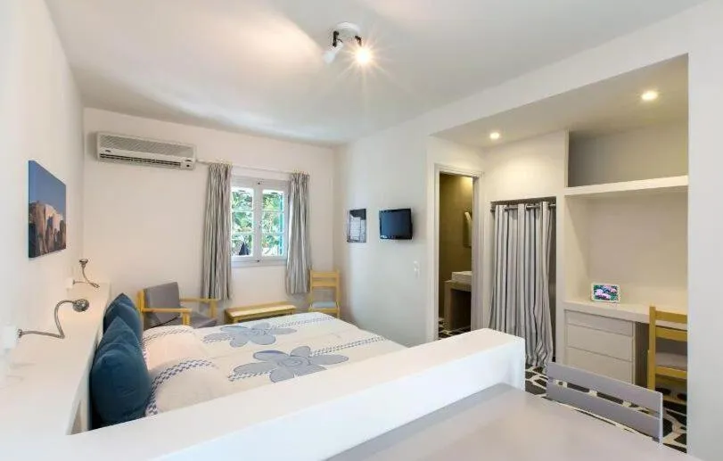 Bed in Byzantio Beach Suites & Wellness