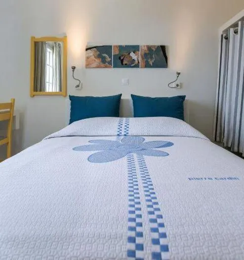 Bed in Byzantio Beach Suites & Wellness
