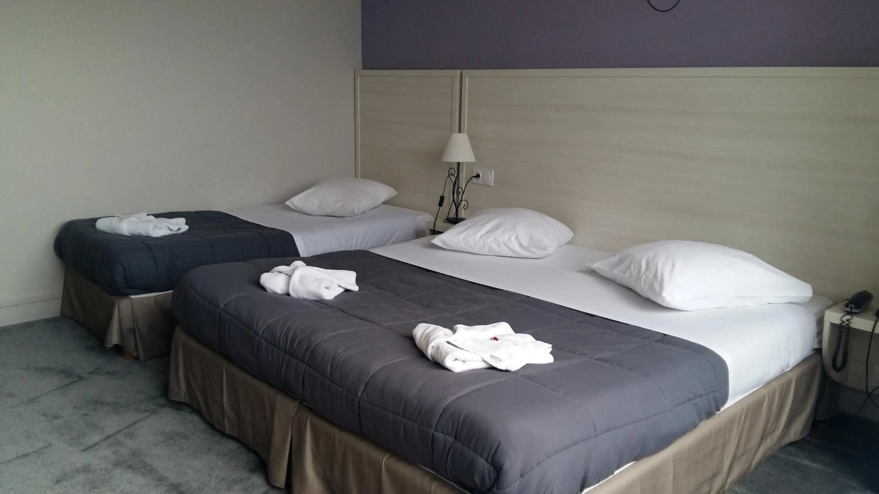 Bed in Hotel des Thermes et du Casino