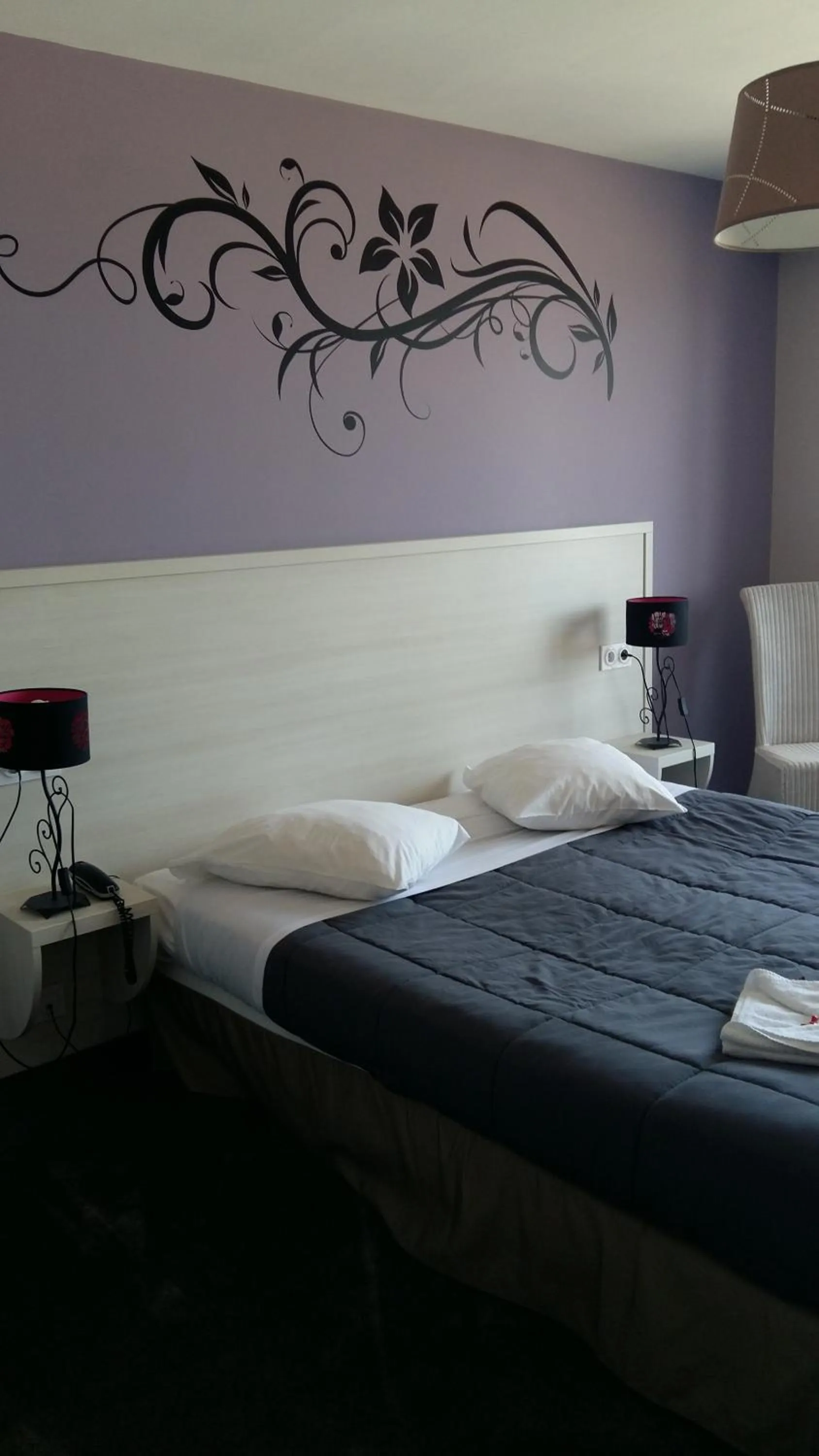 Bed in Hotel des Thermes et du Casino