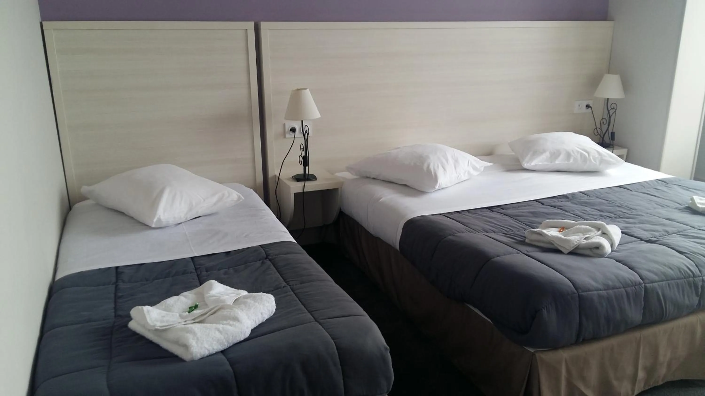 Bed in Hotel des Thermes et du Casino