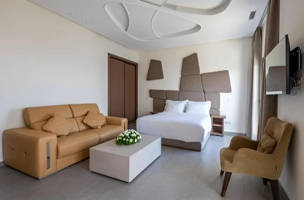 Living room, Bed in Le Tanger Résidence Hôtelière