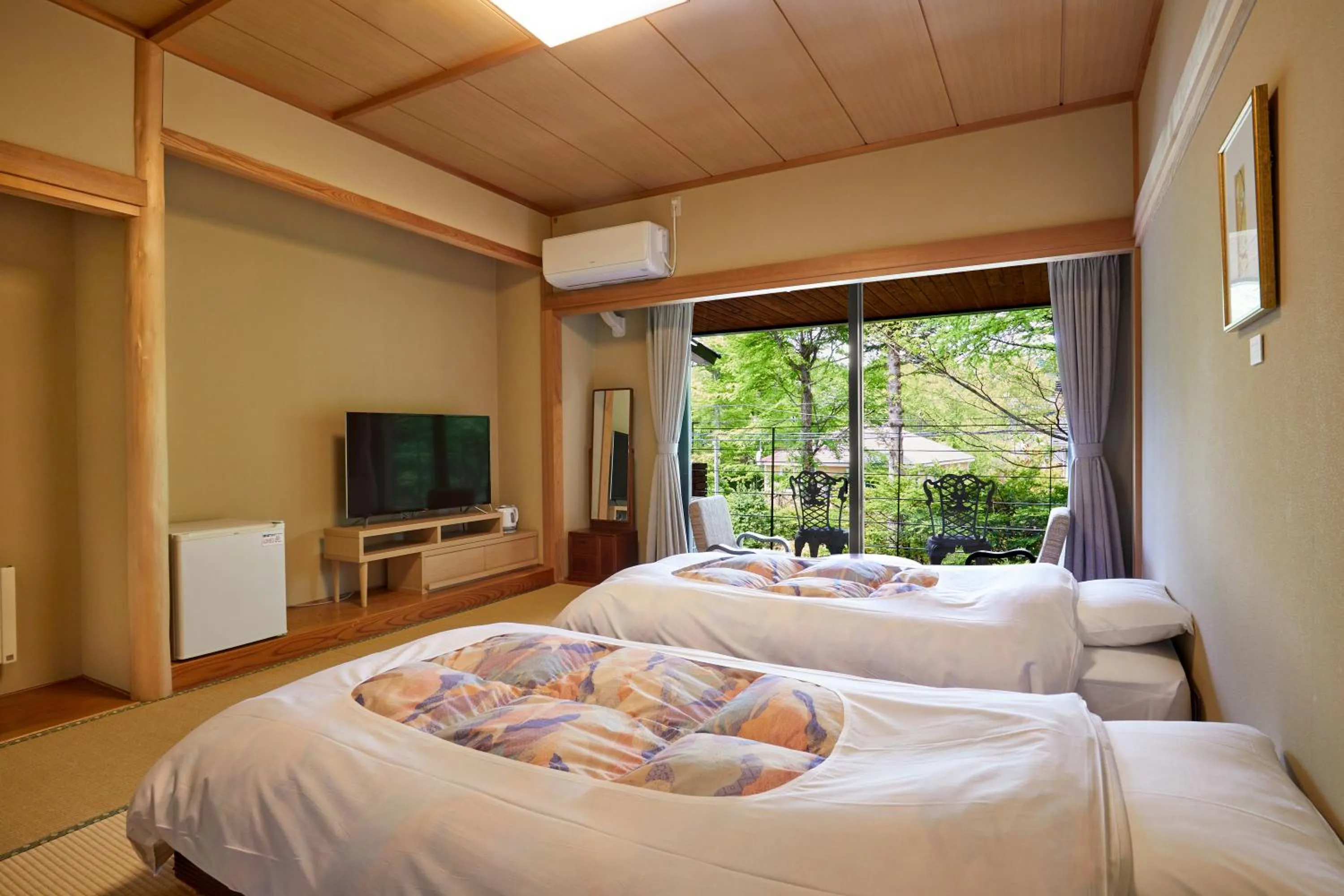 Bed in IKOI Villa