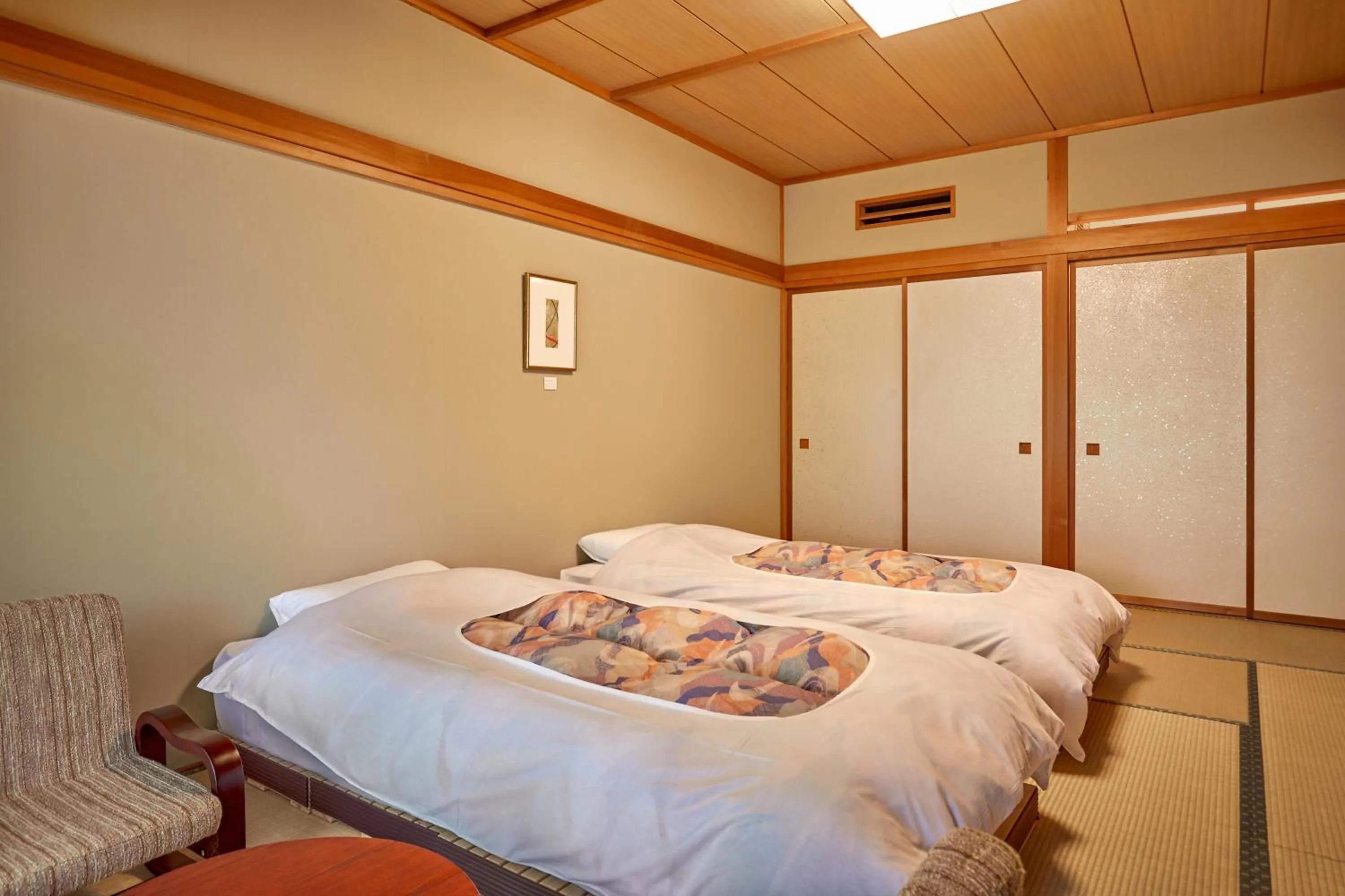 Bed in IKOI Villa