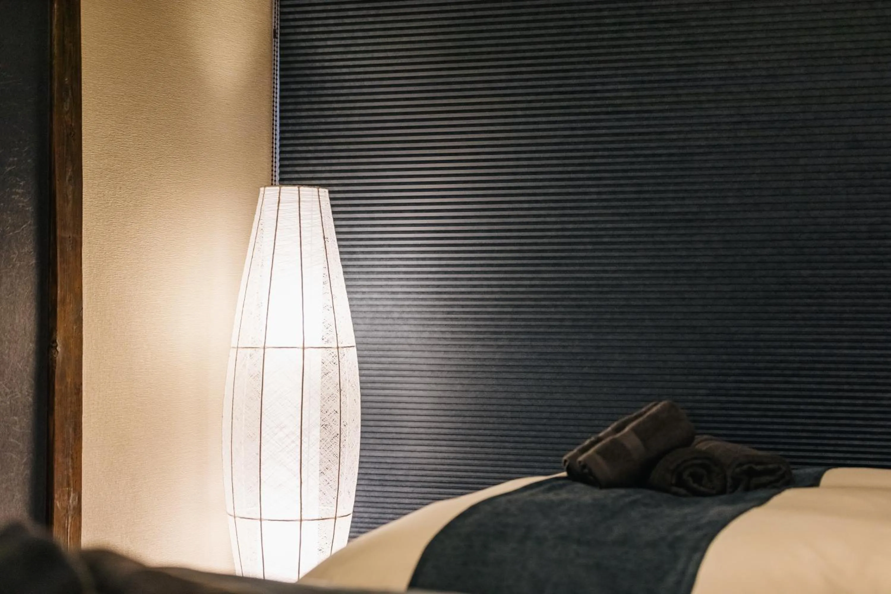 Bed in Prestige Suites Osaka Teradacho