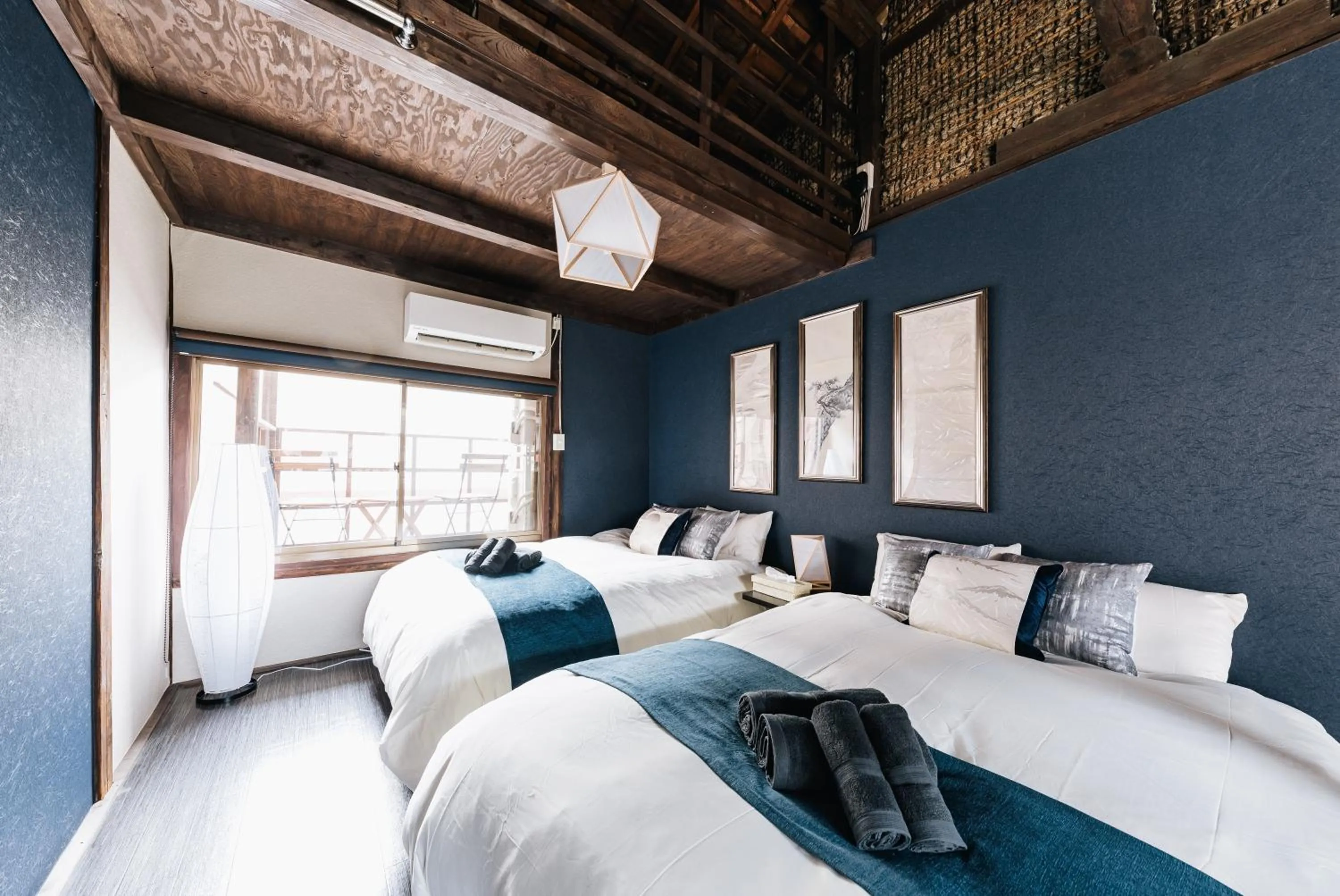 Bed in Prestige Suites Osaka Teradacho