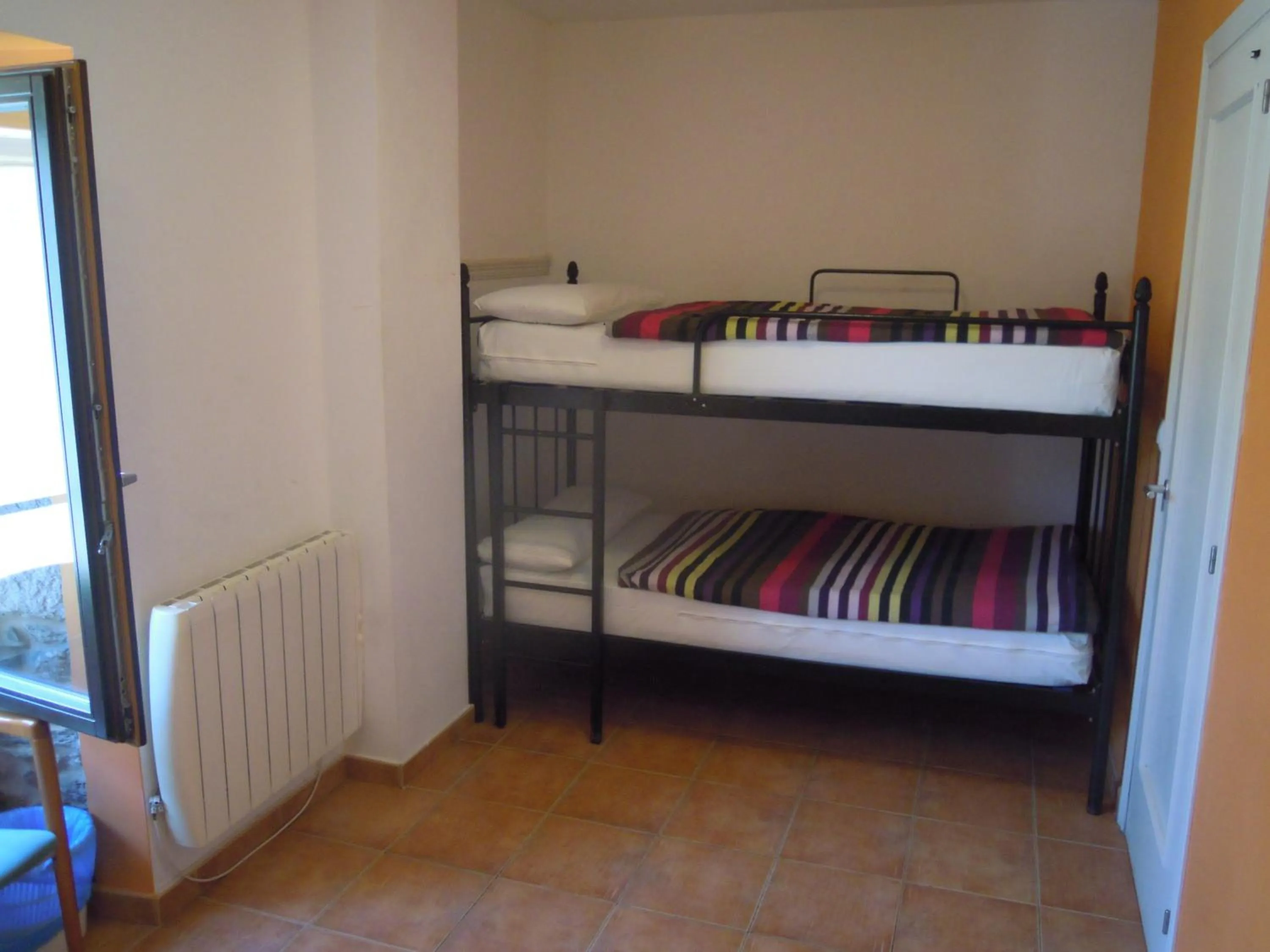 Decorative detail, Bed in Albergue O Durmiñento