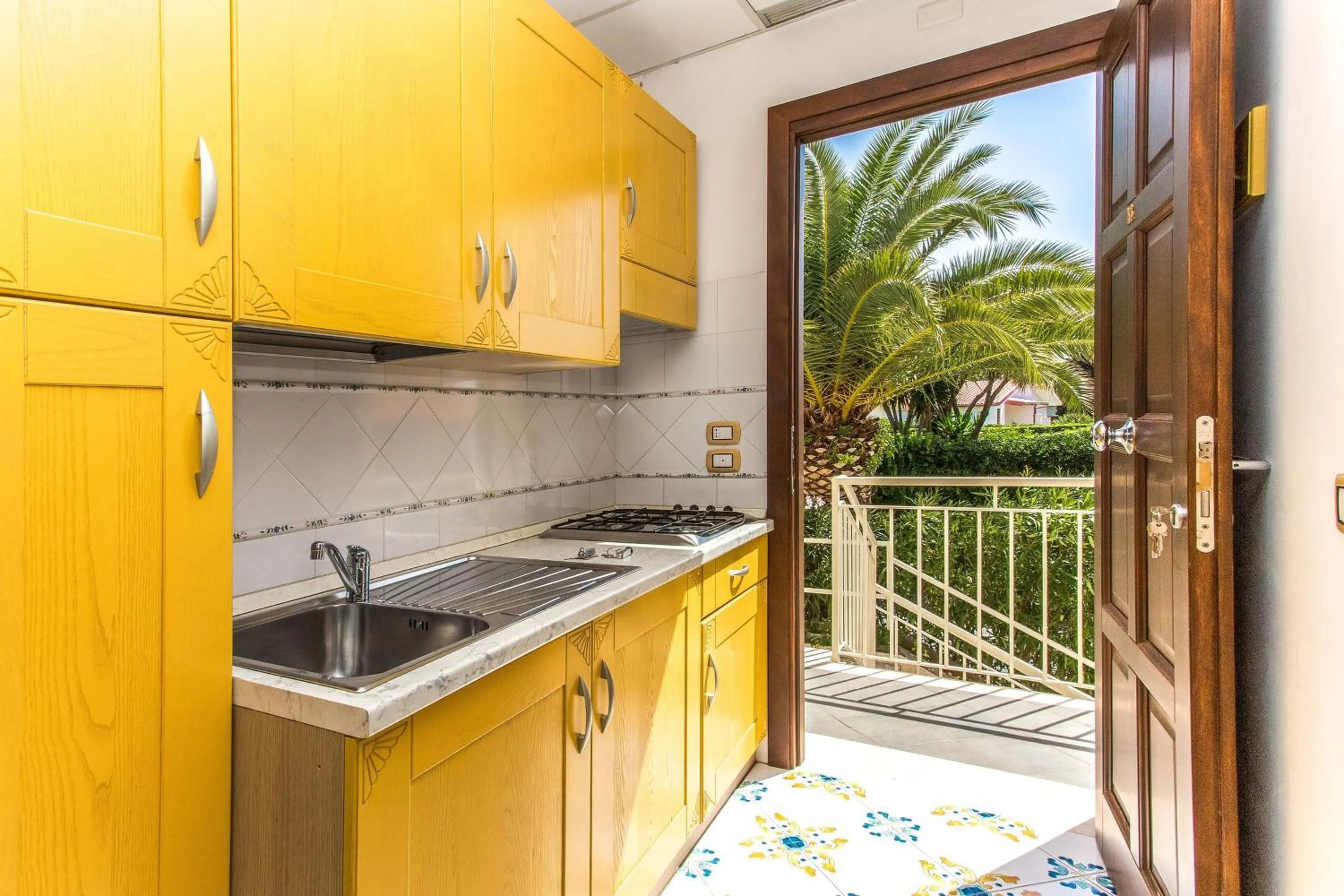 Kitchen or kitchenette in Club Residence La Castellana Mare