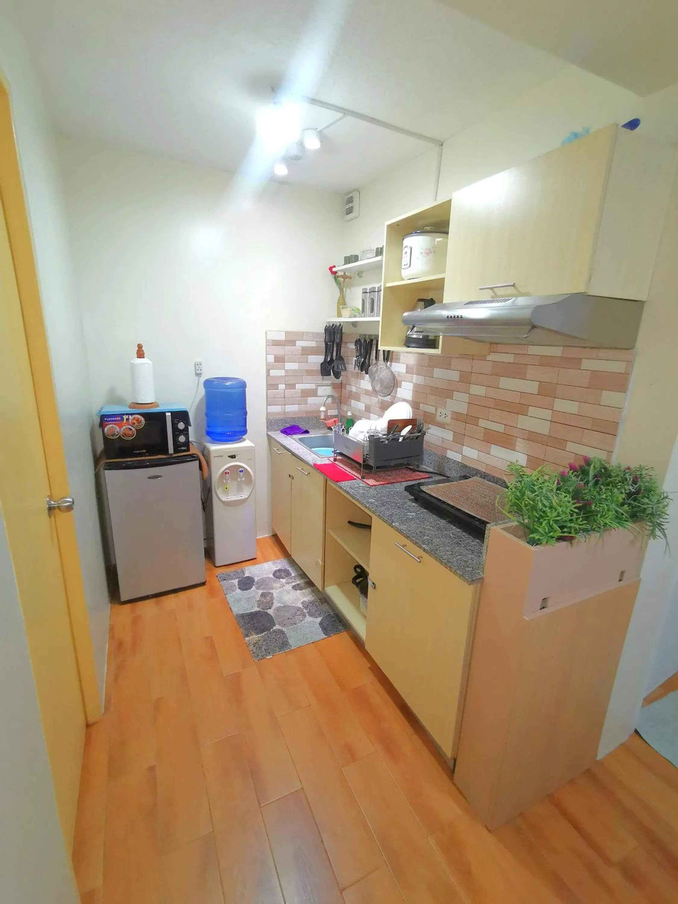 Kitchen or kitchenette in Davao Condo 2BR Pool Wifi Netflix