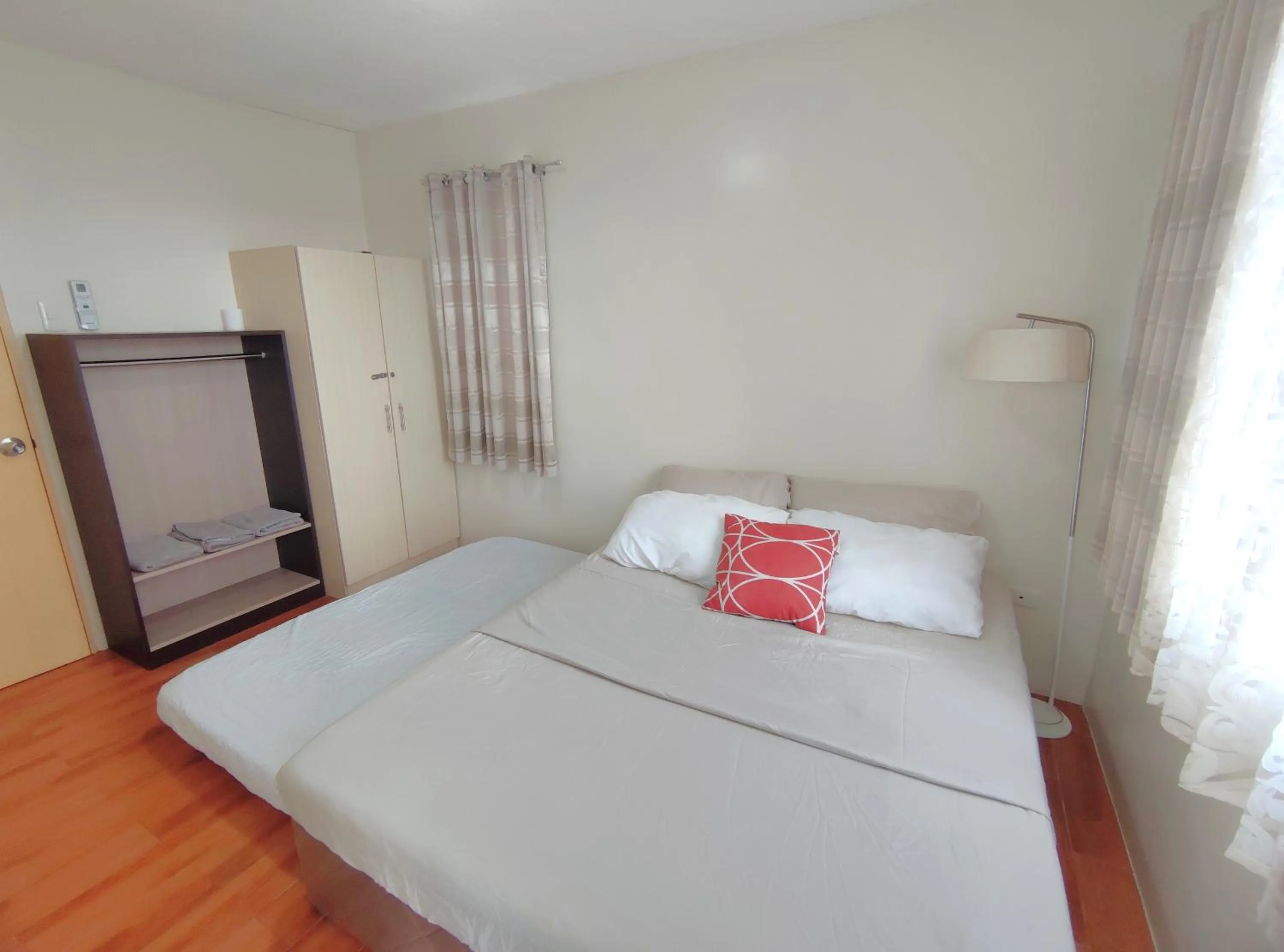 Bed in Davao Condo 2BR Pool Wifi Netflix