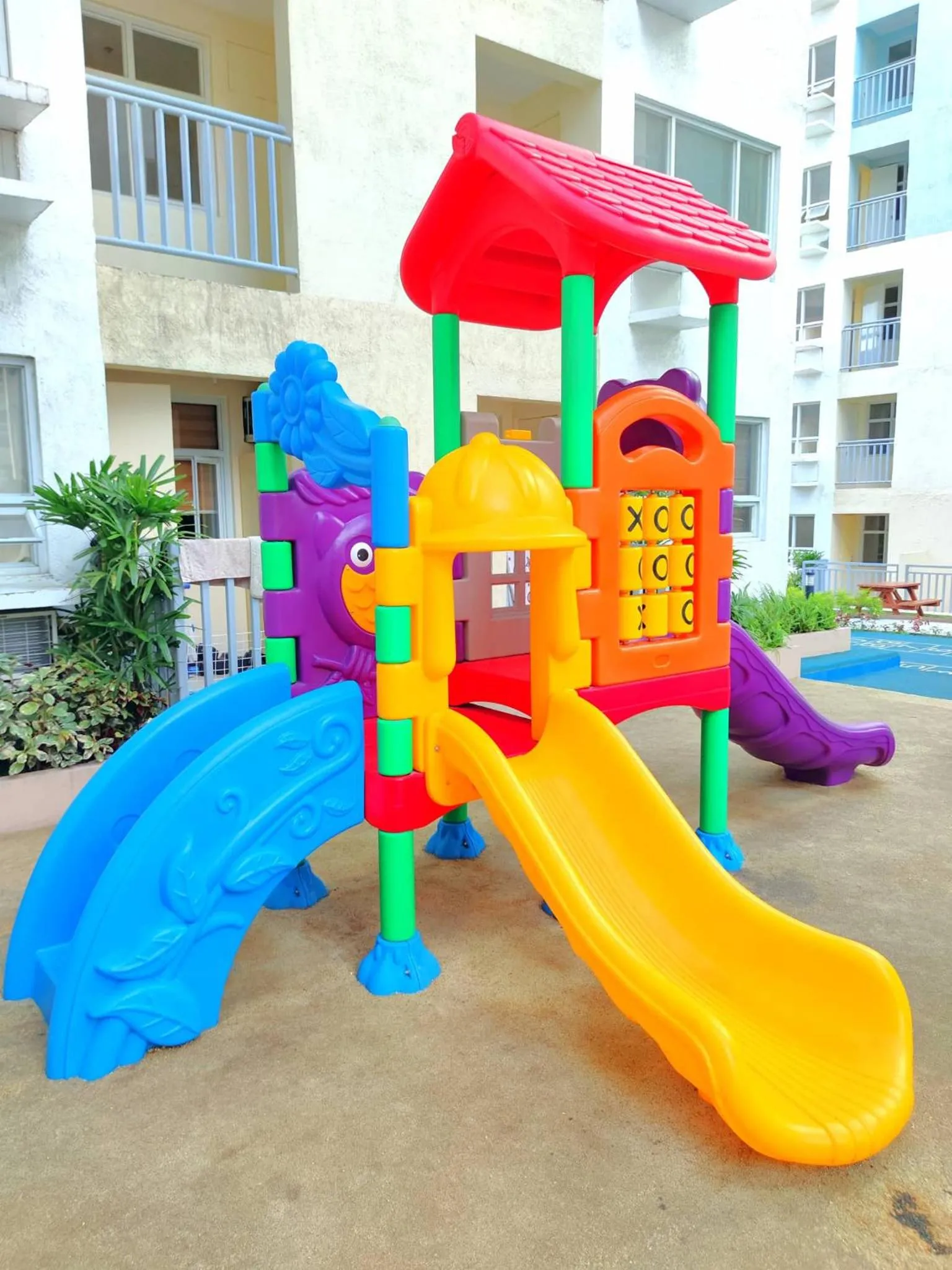 Children play ground in Davao Condo 2BR Pool Wifi Netflix