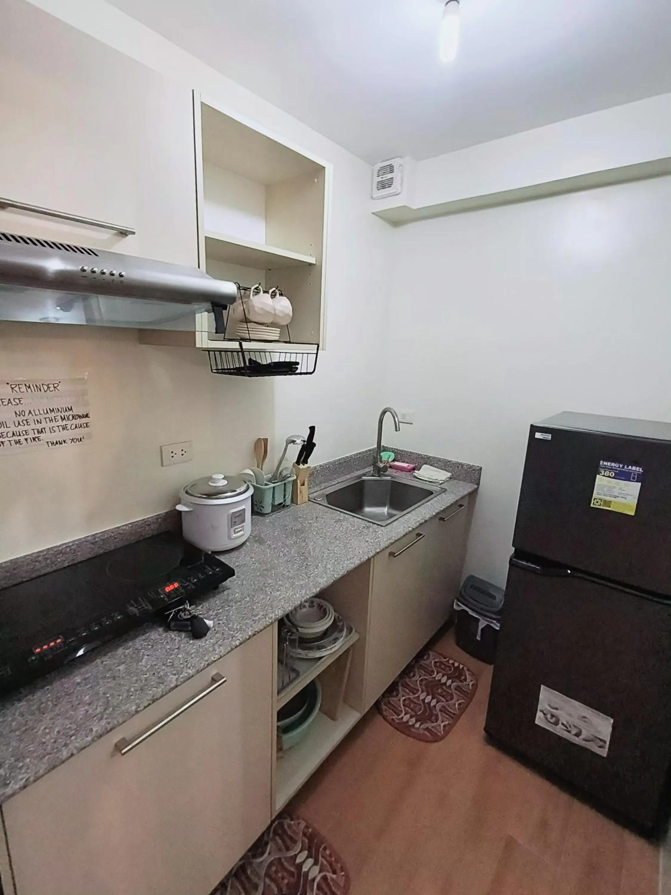 Kitchen or kitchenette in Davao Condo 2BR Pool Wifi Netflix