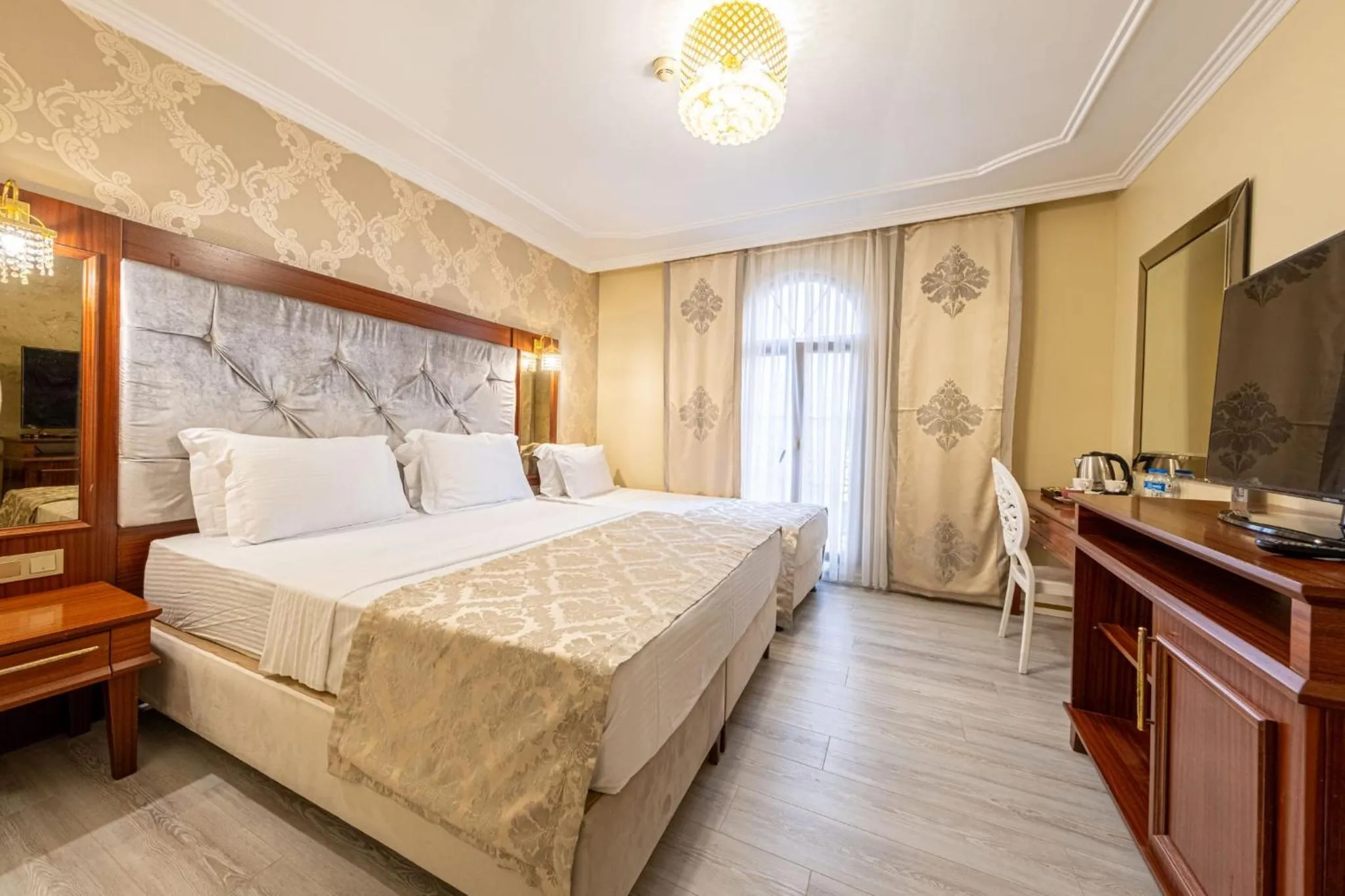 Bed in Myy Boutique Hotel