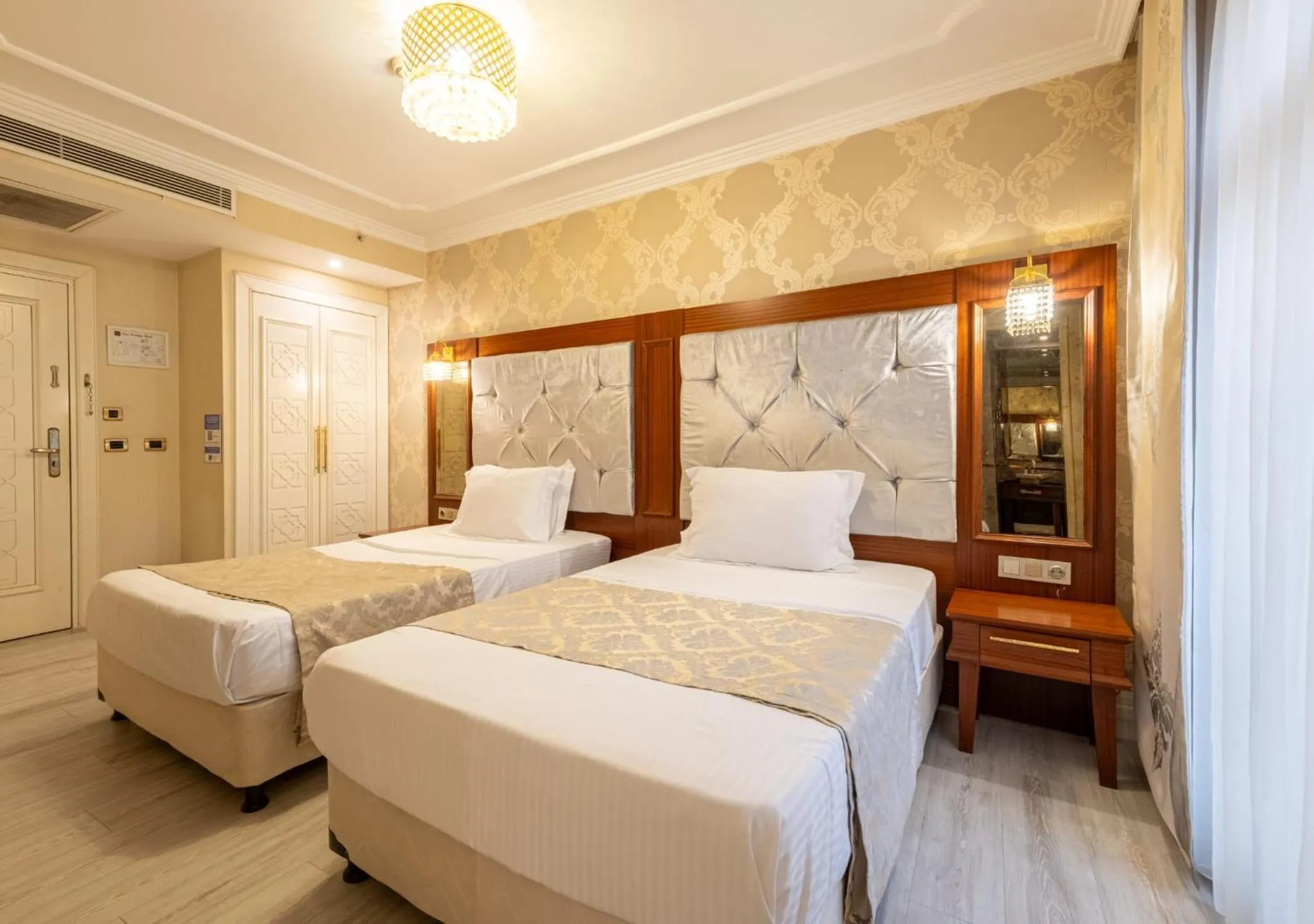 Bed in Myy Boutique Hotel