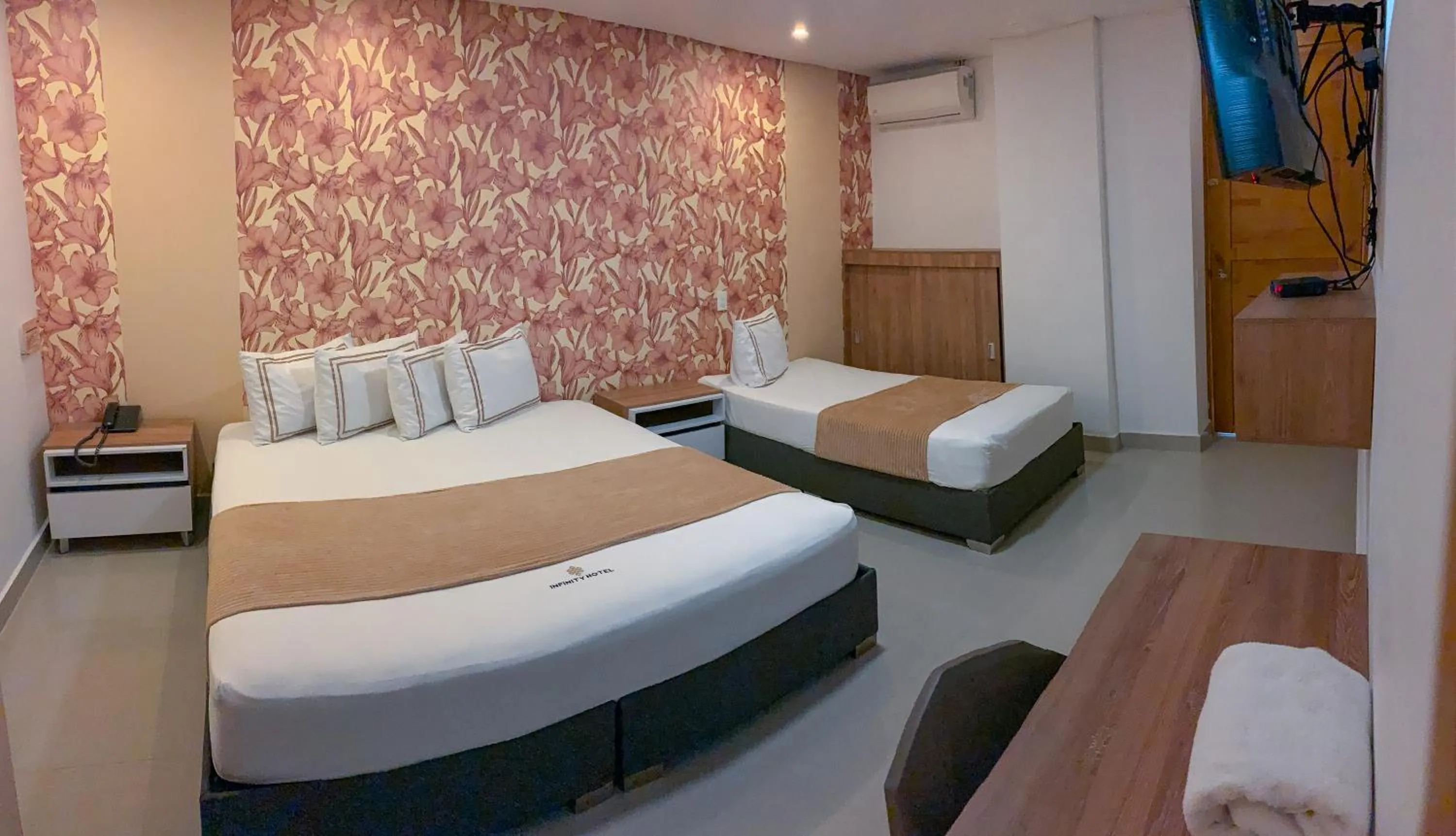Bed in Infinity Hotel