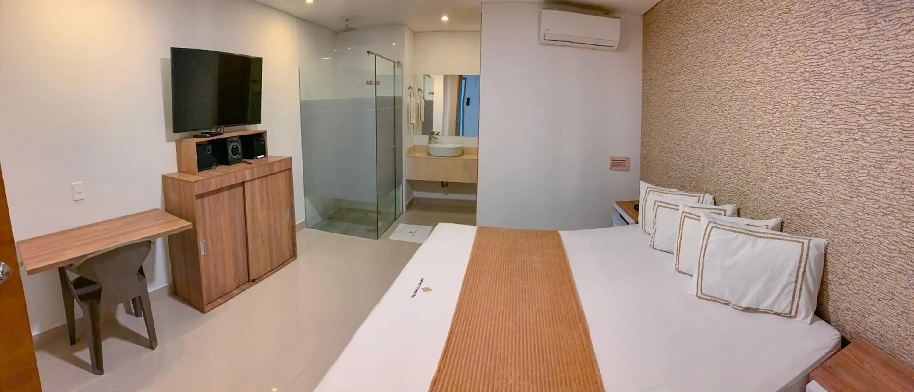 Bed in Infinity Hotel