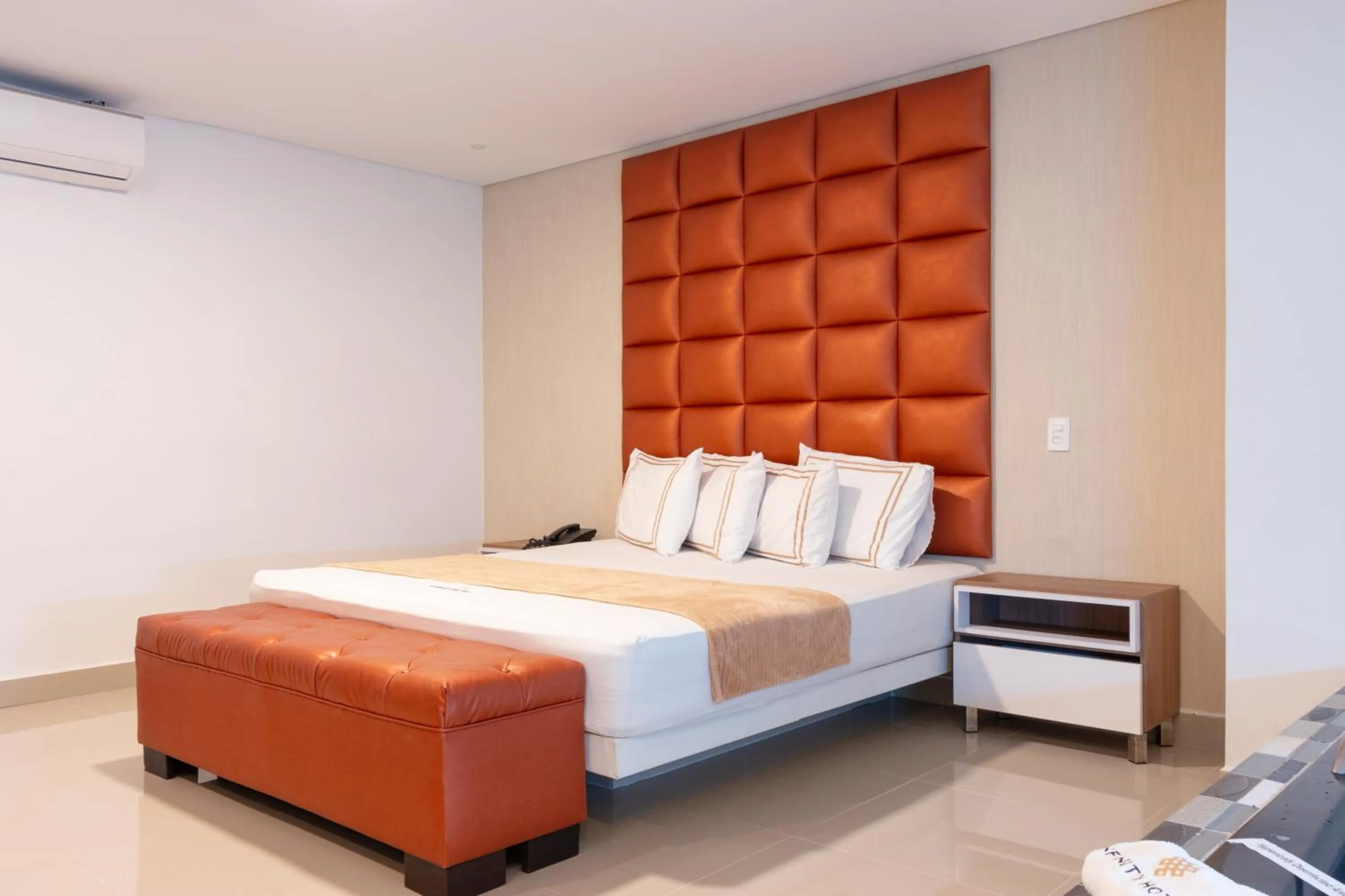 Bed in Infinity Hotel