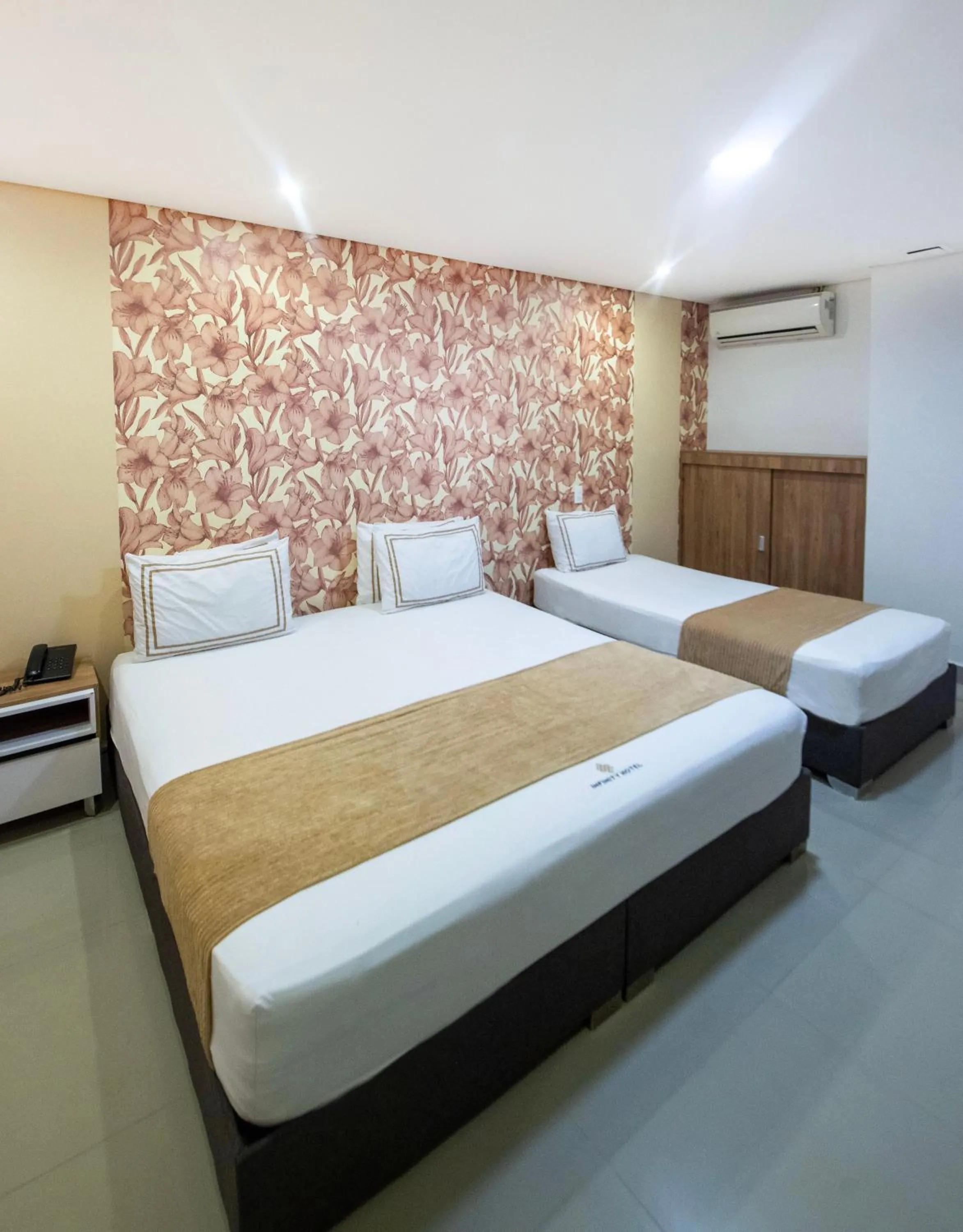 Bed in Infinity Hotel