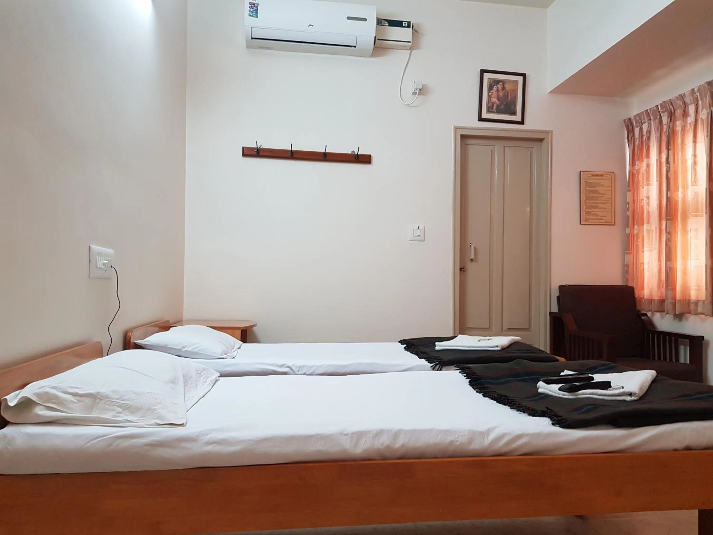 Bed in Sri Kumara Lodge
