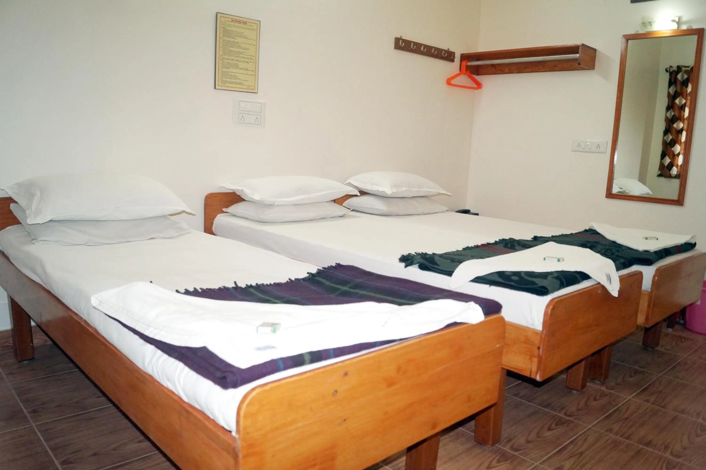 Bed in Sri Kumara Lodge