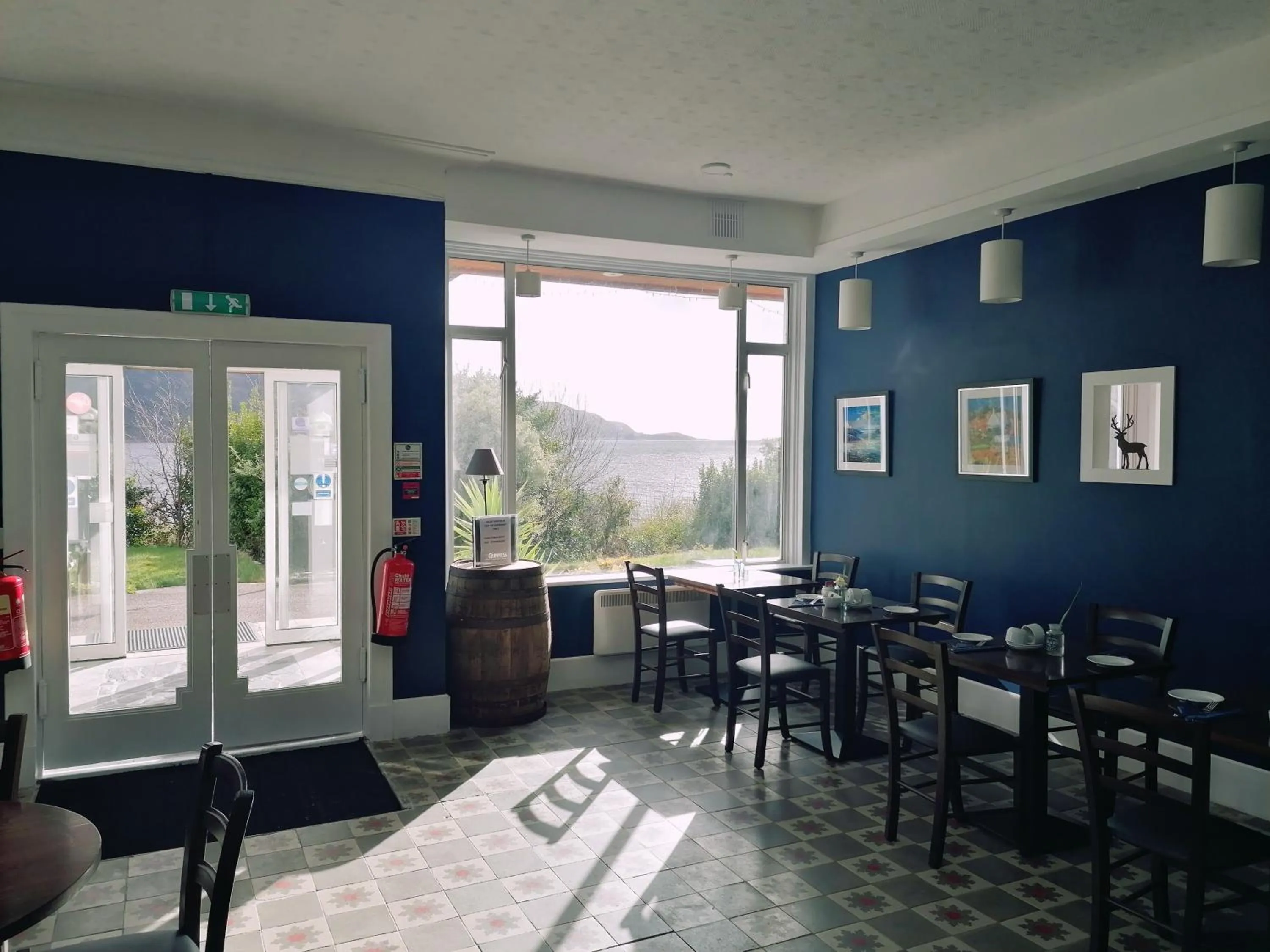 Lounge or bar in The Lodge on the Loch by OYO