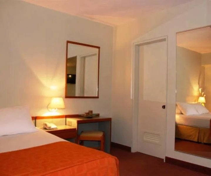 Bed in Hotel Cristina Suites