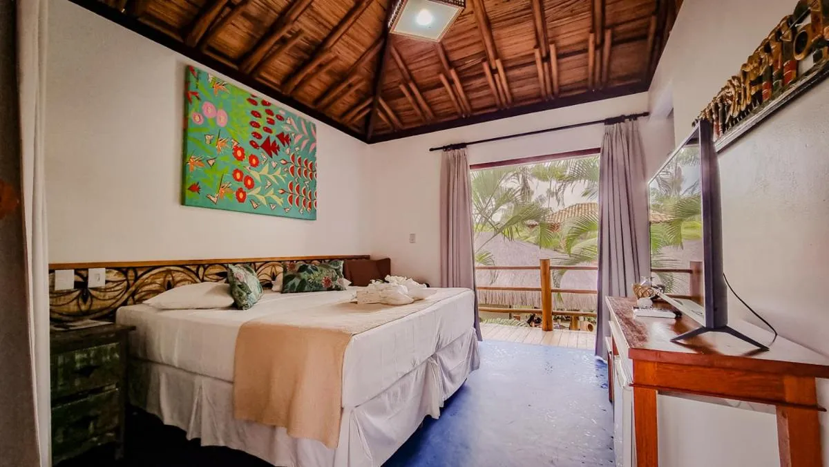 Bed in Pousada Vira Canoa