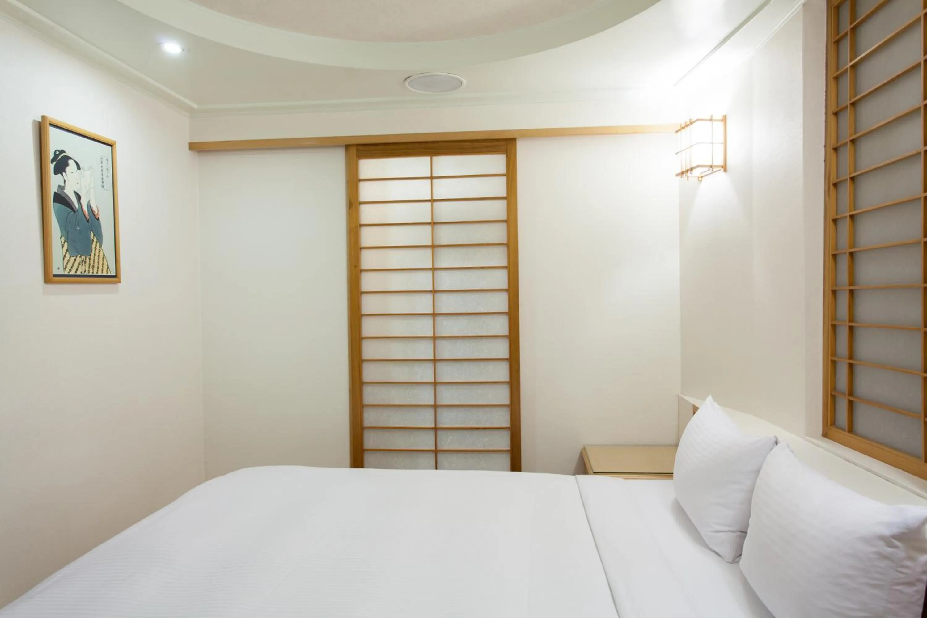 Bed in Hara Zuru Hotel