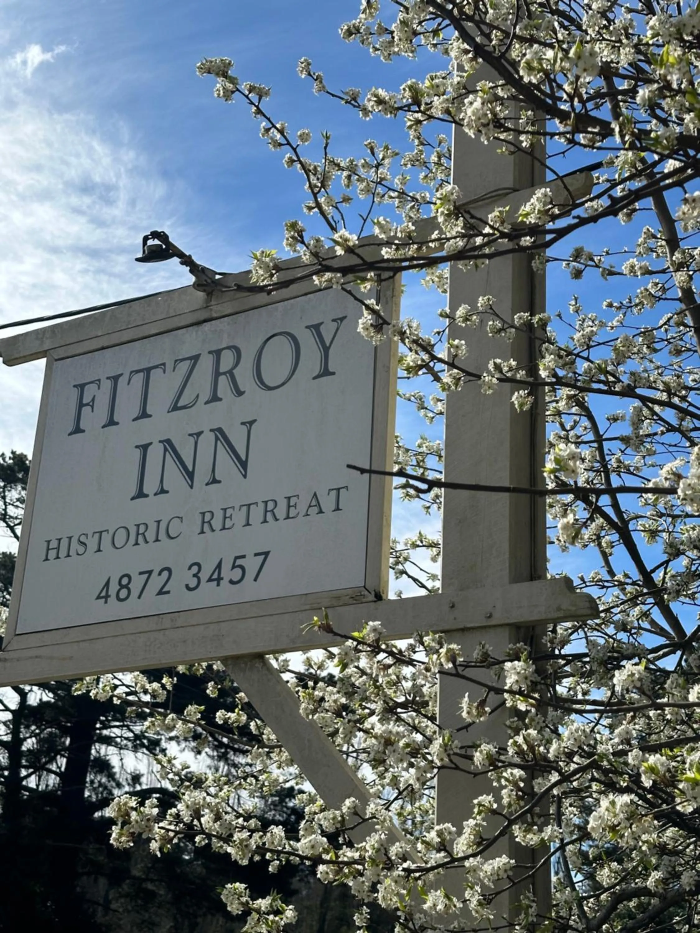 Property logo or sign in Fitzroy Inn Historic Retreat Mittagong