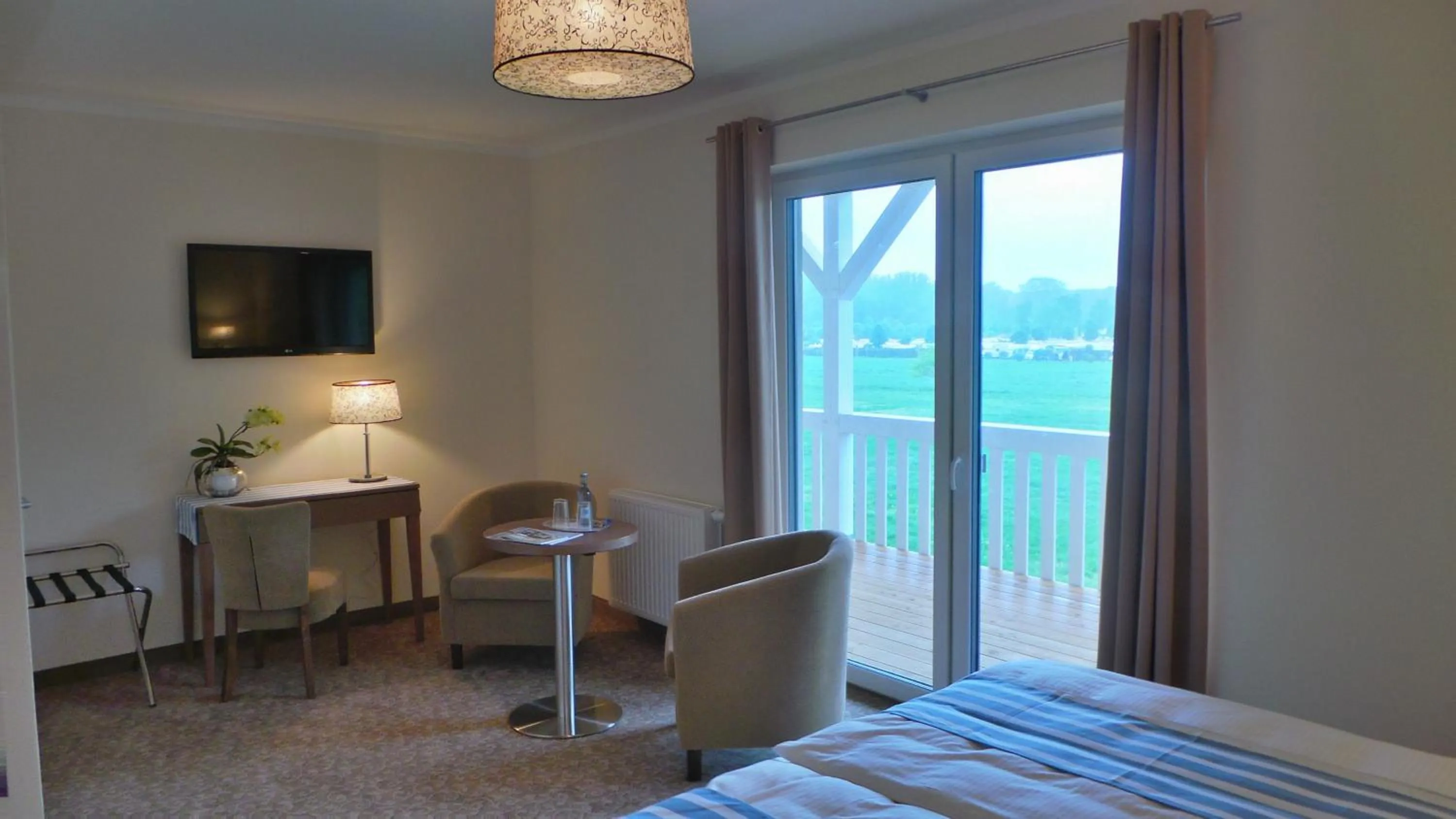 Seating area, Bed in Ostseehotel Boltenhagen