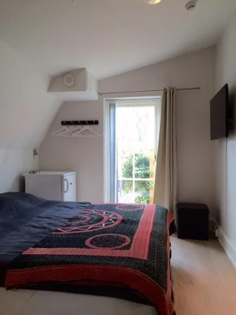 Bed in Mullbärsgårdens Bed and Breakfast