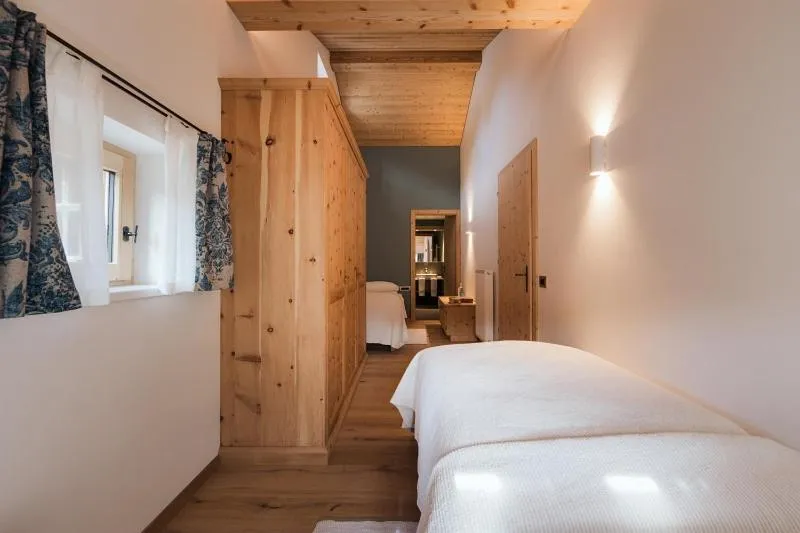 Bed in Berghotel Ladinia